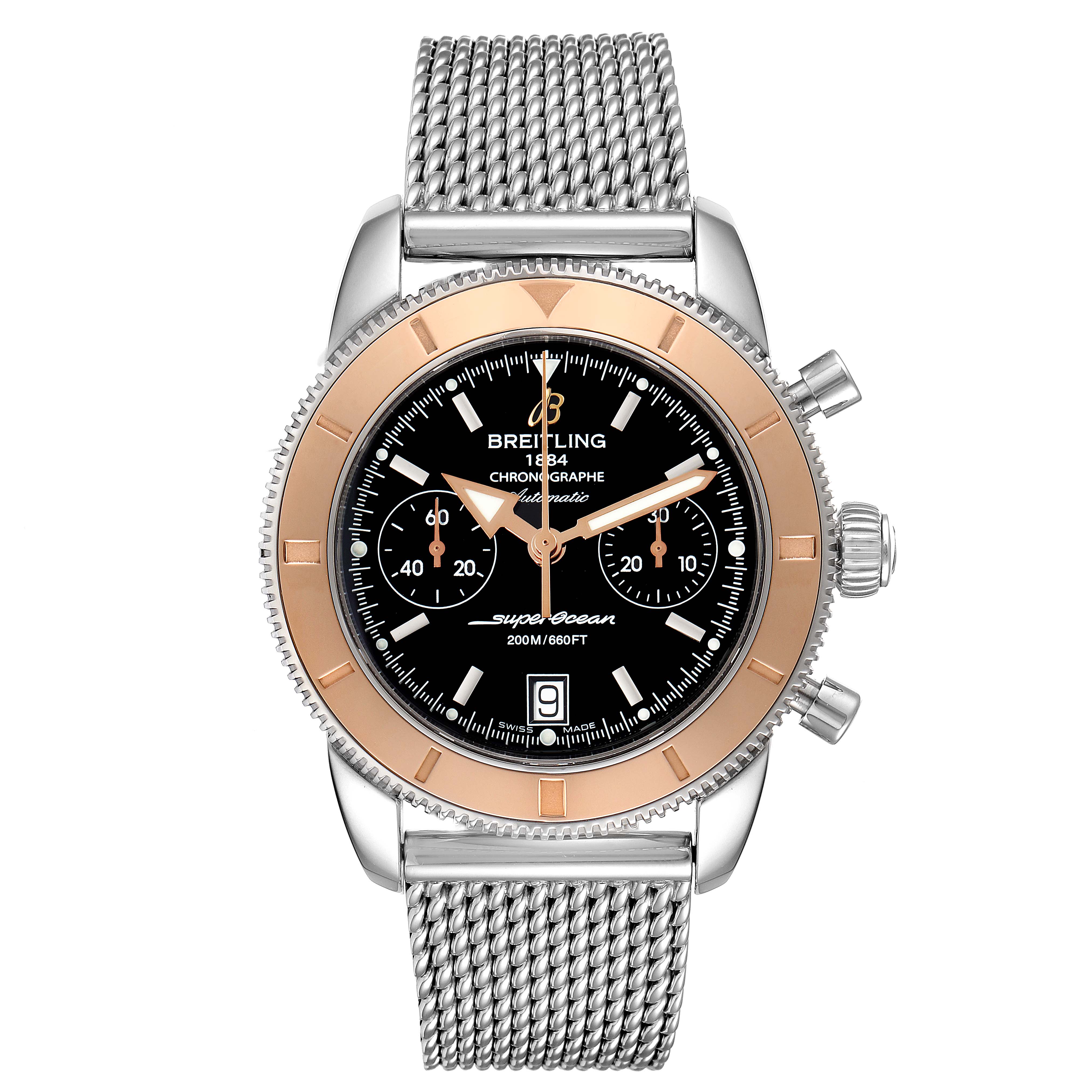 This image shows a front view of a Breitling Superocean U23370 Men
s Steel and Gold (two tone) Black Dial U23370 Men
s Steel and Gold (two tone) Black Dial watch featuring a silver mesh bracelet and a black dial with gold accents.