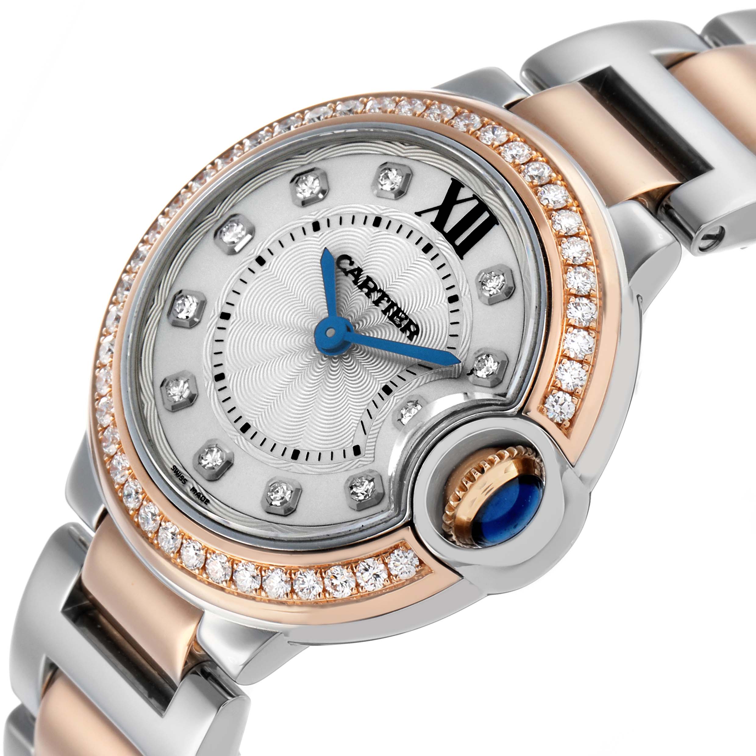 The Cartier Ballon Bleu W3BB0009 Women's Steel and Gold (two tone) Silver Dial watch is shown from an angled close-up, highlighting the dial, bezel, crown, and part of the bracelet.