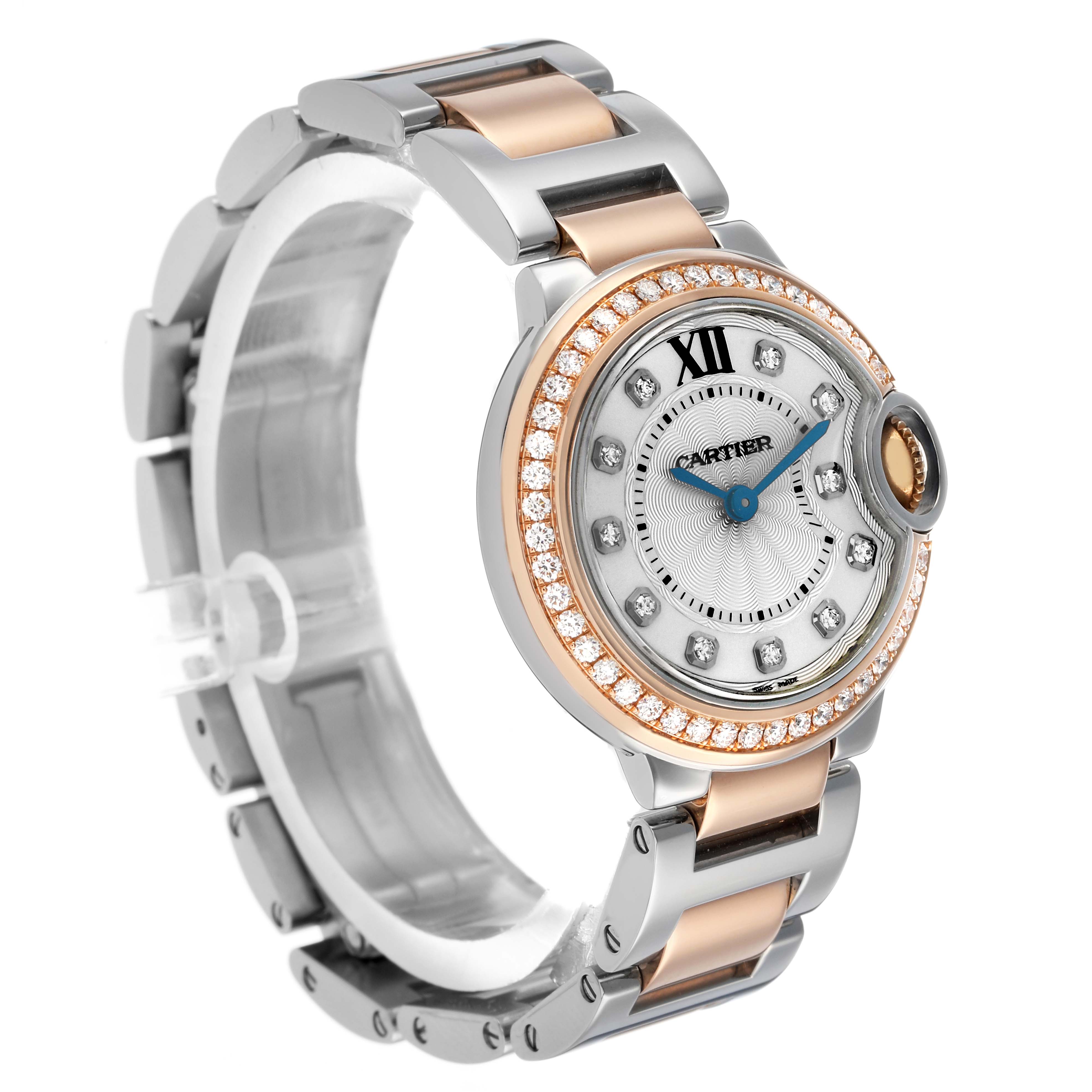 The Cartier Ballon Bleu W3BB0009 Women's Steel and Gold (two tone) Silver Dial watch is shown at a three-quarter angle, highlighting its face, bezel, and two-tone bracelet.