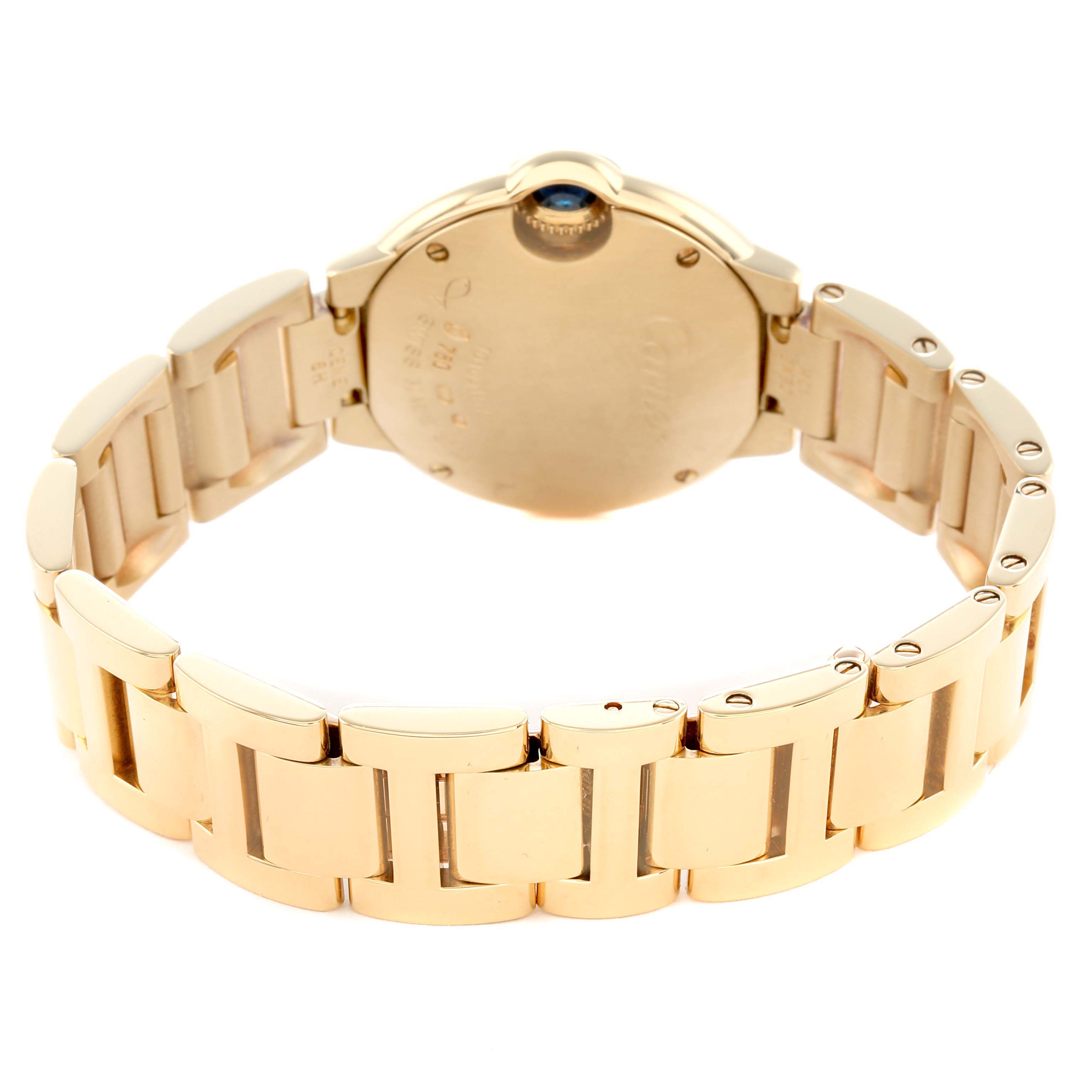 The image shows the back of a Cartier Ballon Bleu WE9001Z3 Women's Yellow Gold Silver Dial watch with its gold bracelet and case.