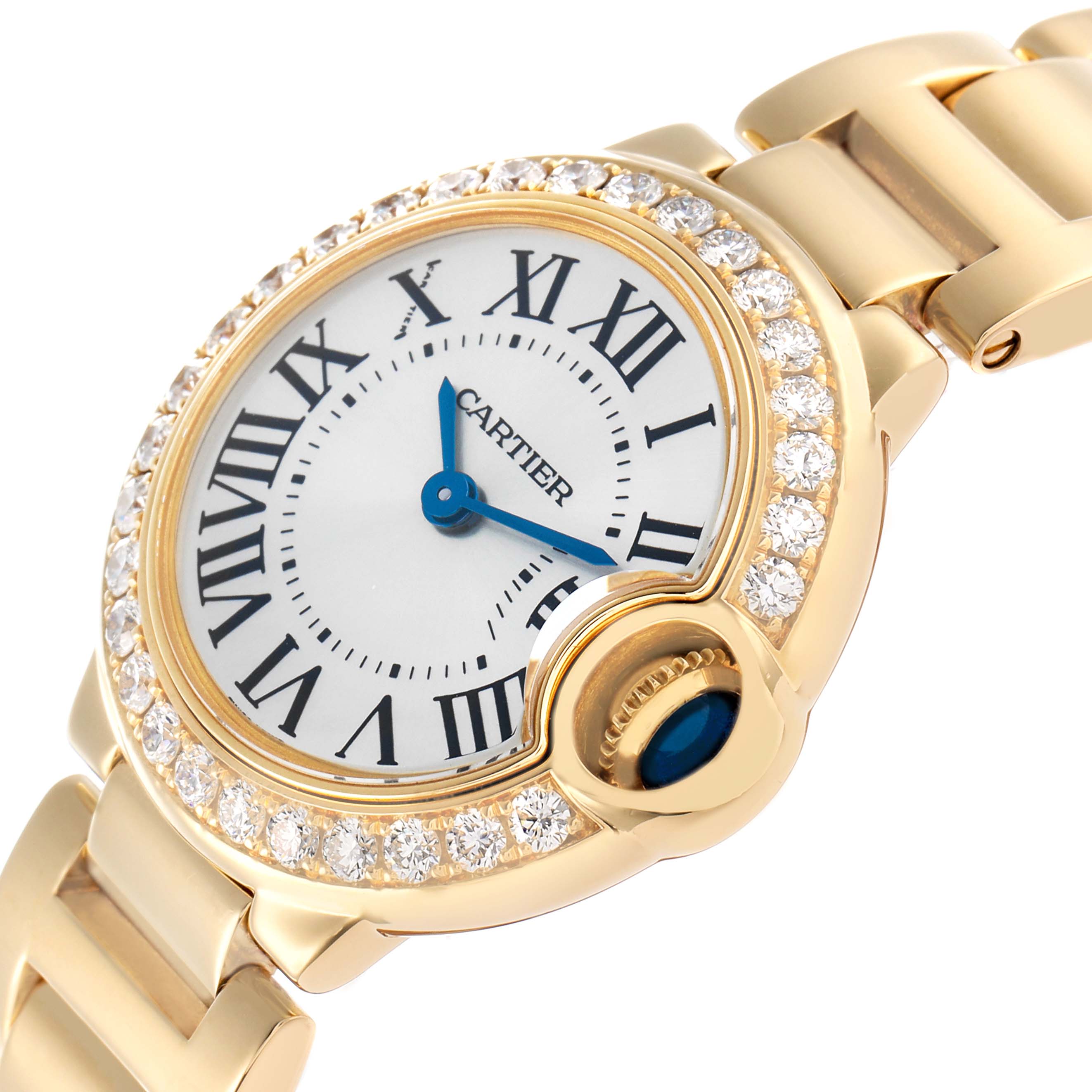 The Cartier Ballon Bleu WE9001Z3 Women's Yellow Gold Silver Dial watch is shown at a slight angle, highlighting its diamond bezel and blue cabochon crown.
