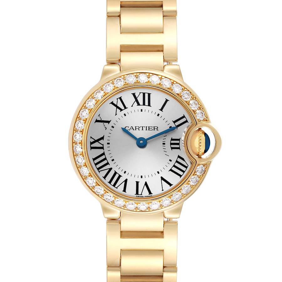 The Cartier Ballon Bleu WE9001Z3 Women's Yellow Gold Silver Dial watch is shown from a front angle, displaying its face, bezel, crown, and bracelet.