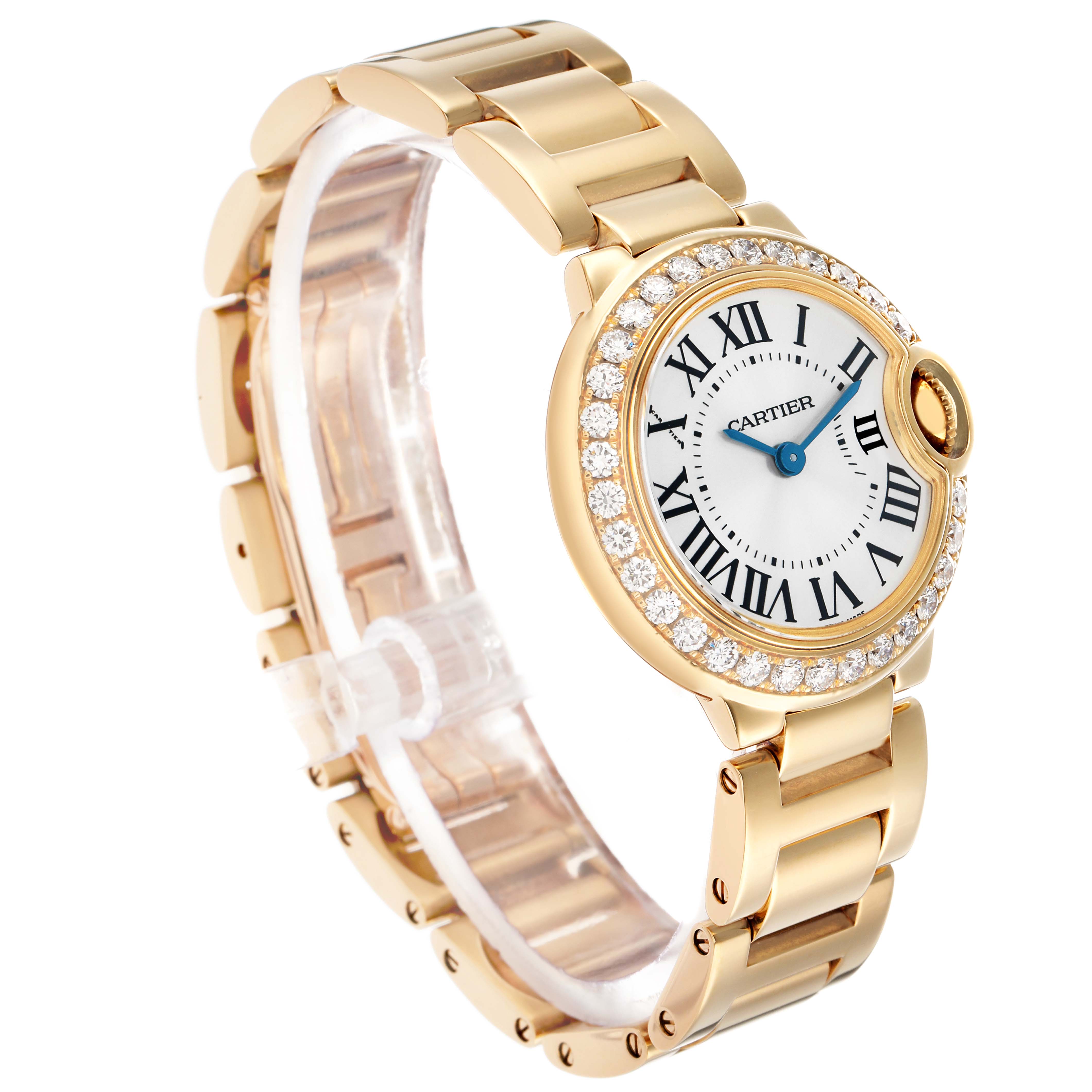 The Cartier Ballon Bleu WE9001Z3 Women's Yellow Gold Silver Dial watch is shown at a three-quarter angle highlighting its gold bracelet, diamond bezel, and roman numeral dial.