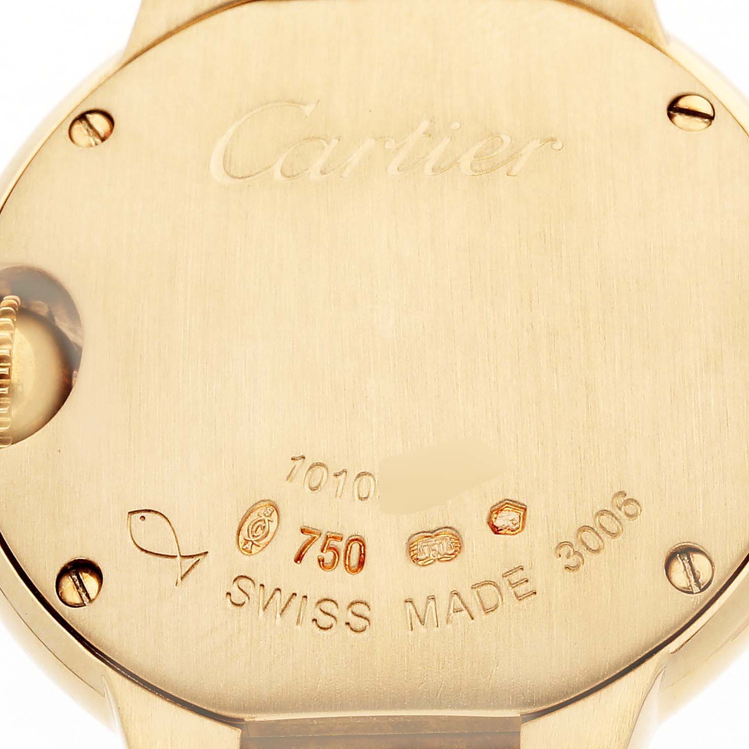 The image shows the back case of the Ballon Bleu de Cartier watch, highlighting engravings and hallmarks.