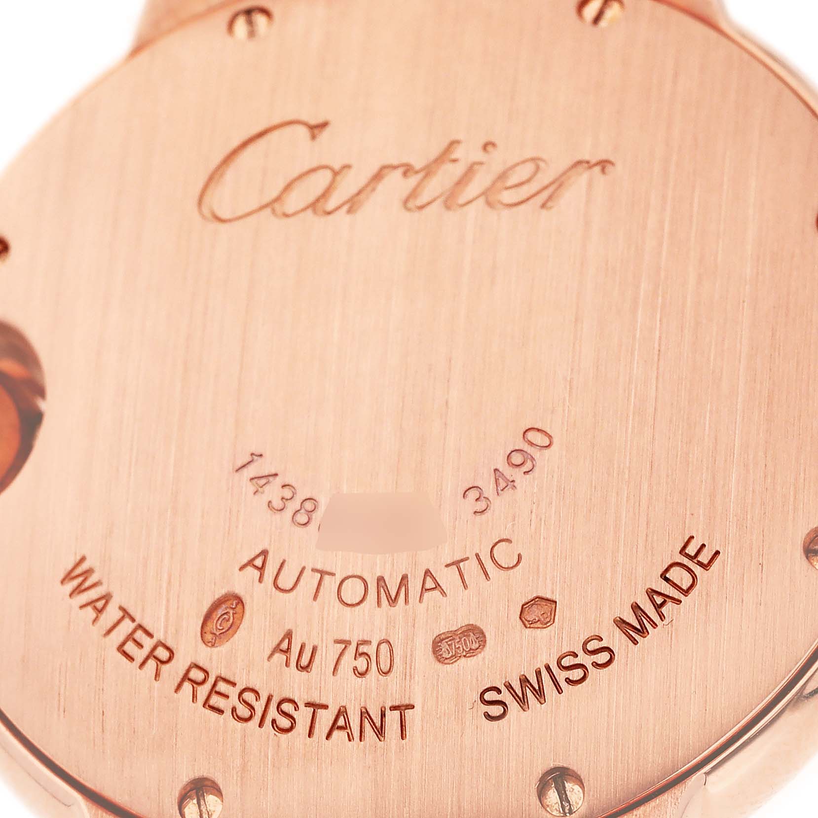 The image shows the back case of a Cartier Ballon Bleu WE902036 Women
s Rose Gold Silver Dial WE902036 Women
s Rose Gold Silver Dial watch, highlighting engravings and hallmarks.