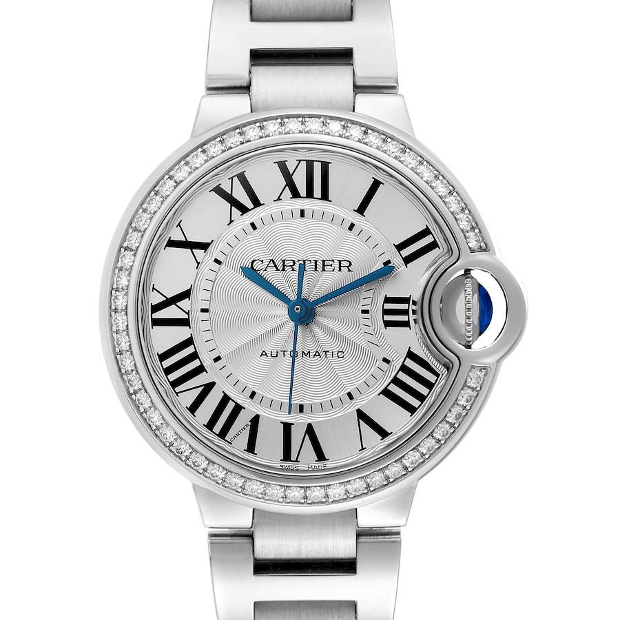 The Cartier Ballon Bleu watch is shown from a front angle, featuring the dial, case, and part of the bracelet.