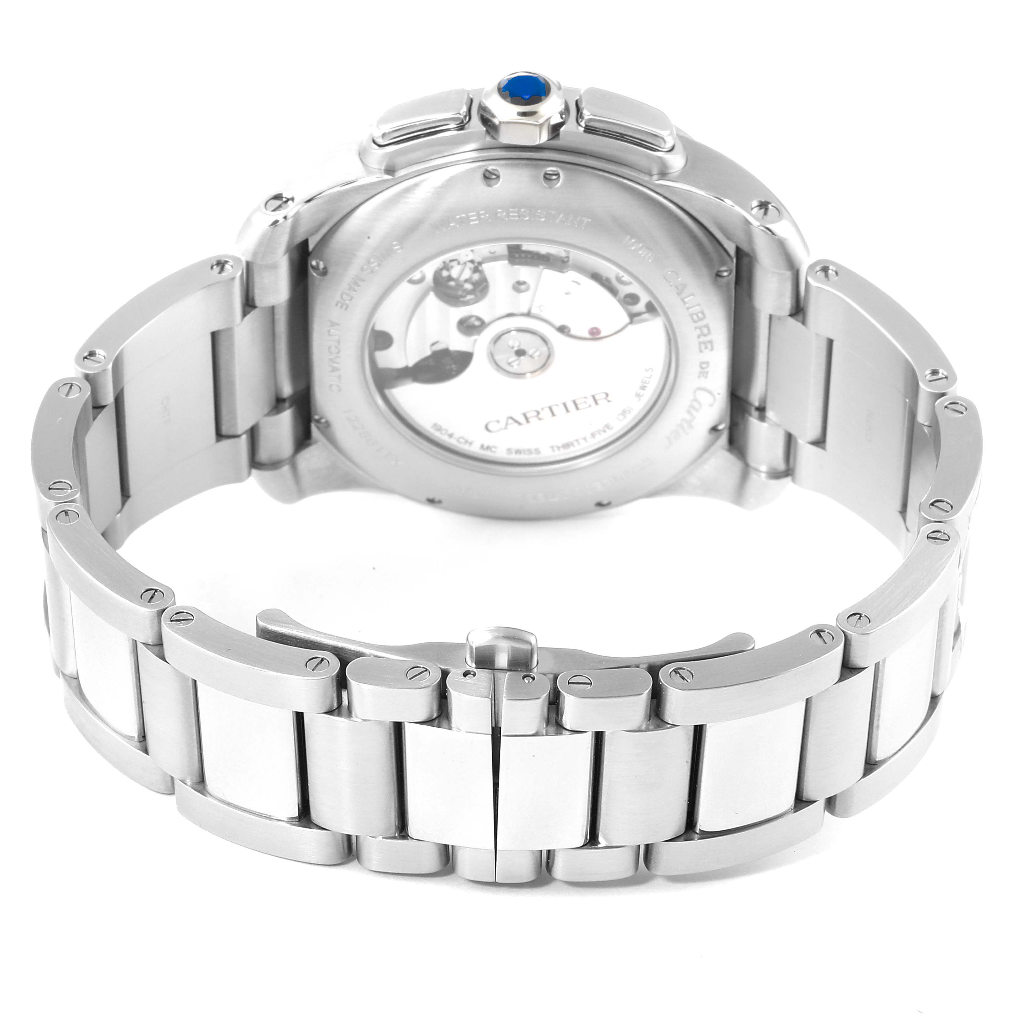 The image shows the back view of the Calibre de Cartier watch by Cartier, highlighting its movement and bracelet.