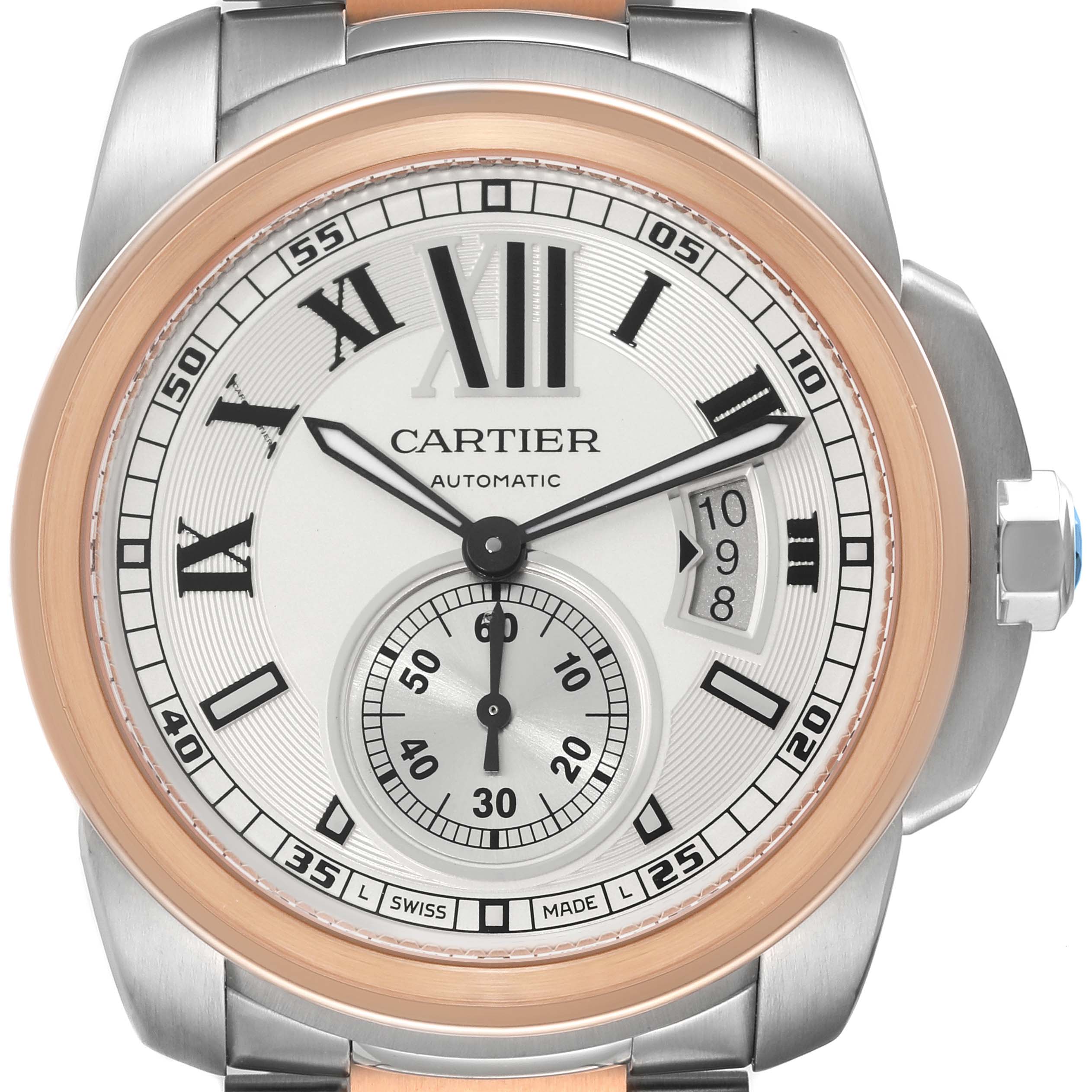 The image shows a front view of a Calibre de Cartier watch by Cartier, featuring a rose gold bezel and Roman numeral hour markers.