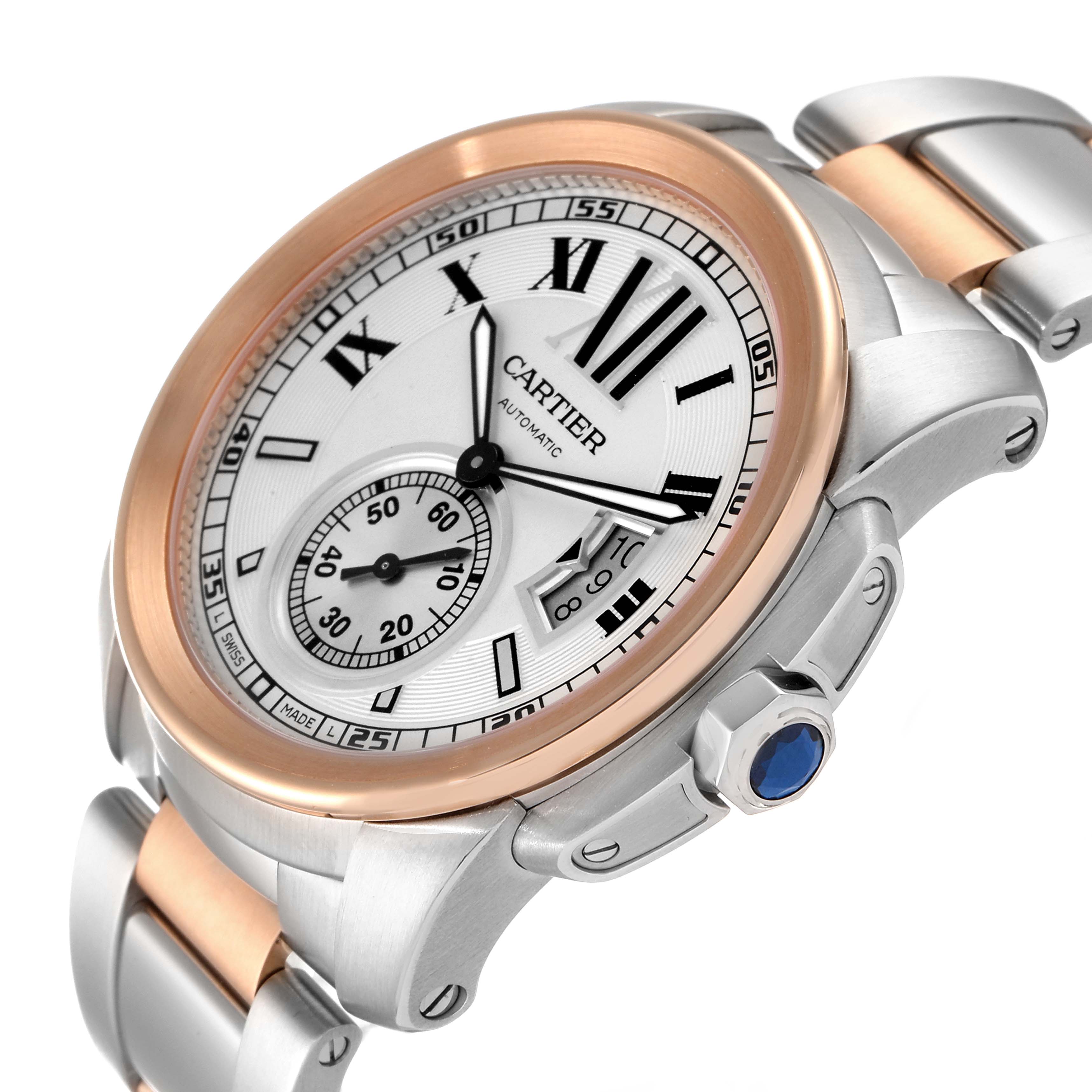 The image shows a Calibre de Cartier watch by Cartier from a front angle, highlighting the dial, bezel, and part of the bracelet.