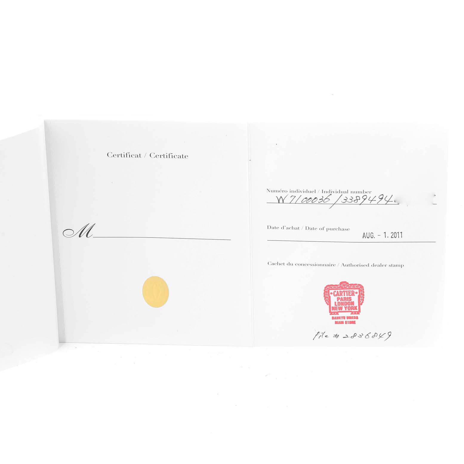 This image shows an open warranty card or certificate for the Calibre de Cartier model by Cartier, dated August 1, 2011.