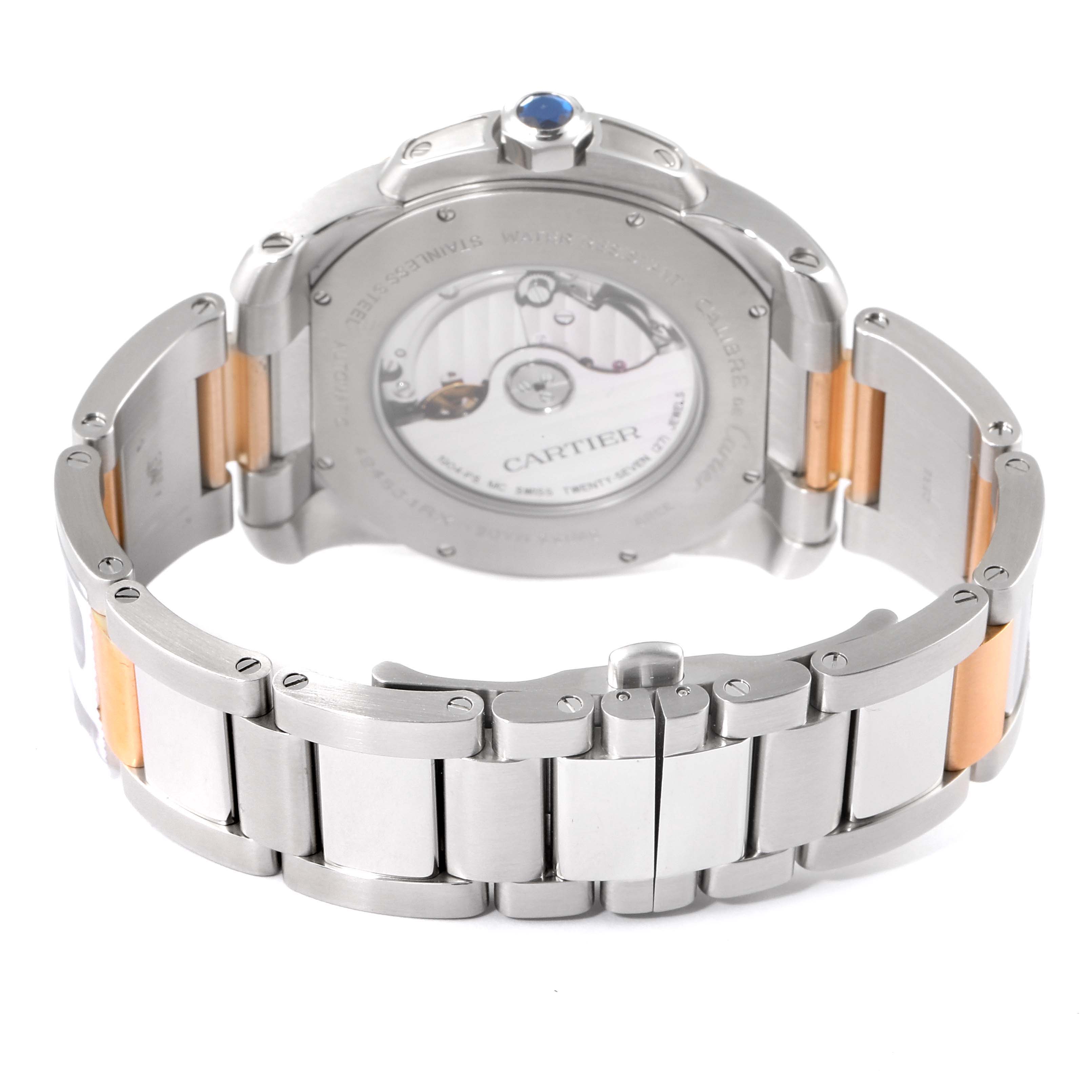 The image shows the back view of a Calibre de Cartier watch by Cartier, highlighting the bracelet and the watch's movement.
