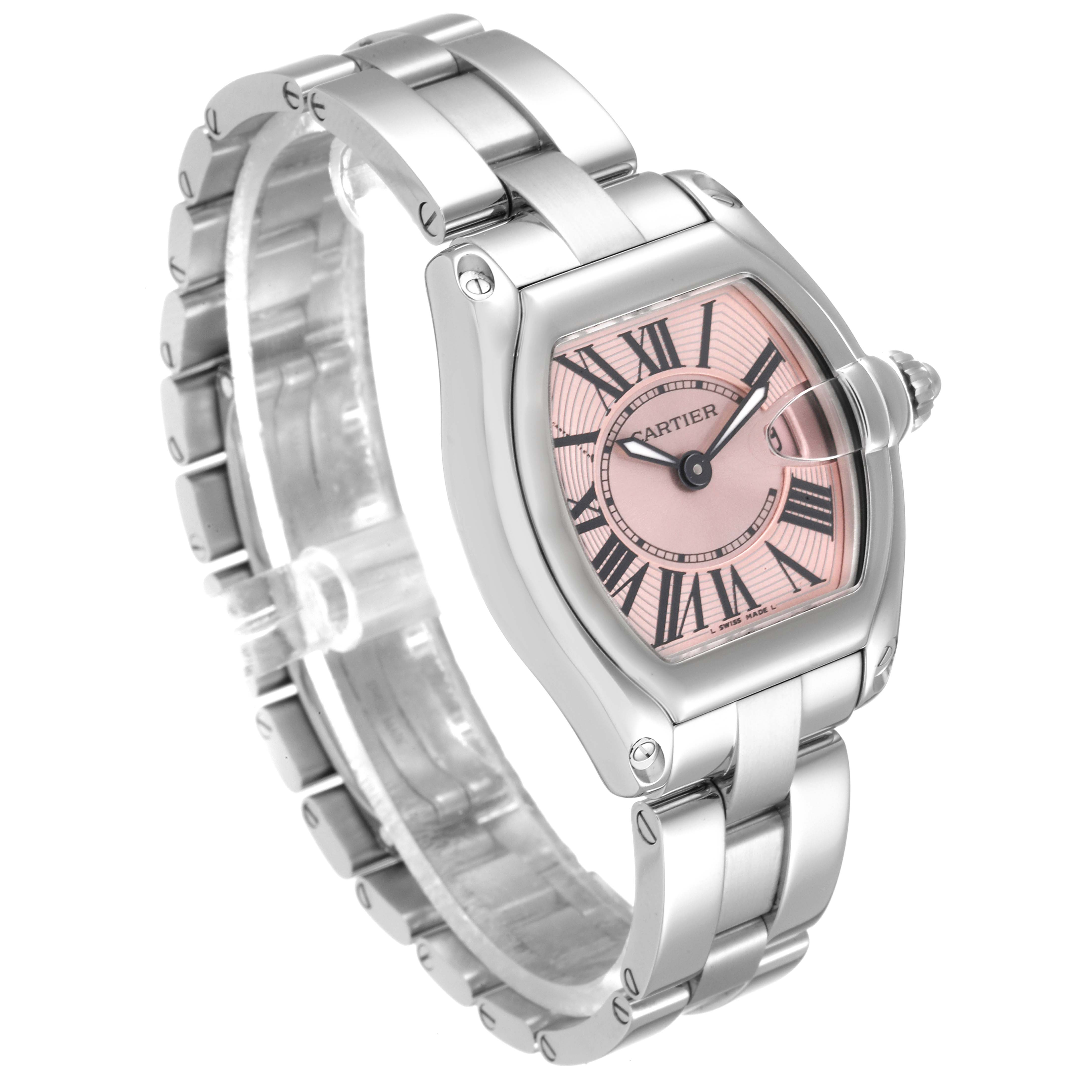 This Cartier Roadster W62017V3 Women's Stainless Steel Pink Dial W62017V3 Women's Stainless Steel Pink Dial watch is shown at a slight angle, highlighting its pink dial, stainless steel case, and bracelet.