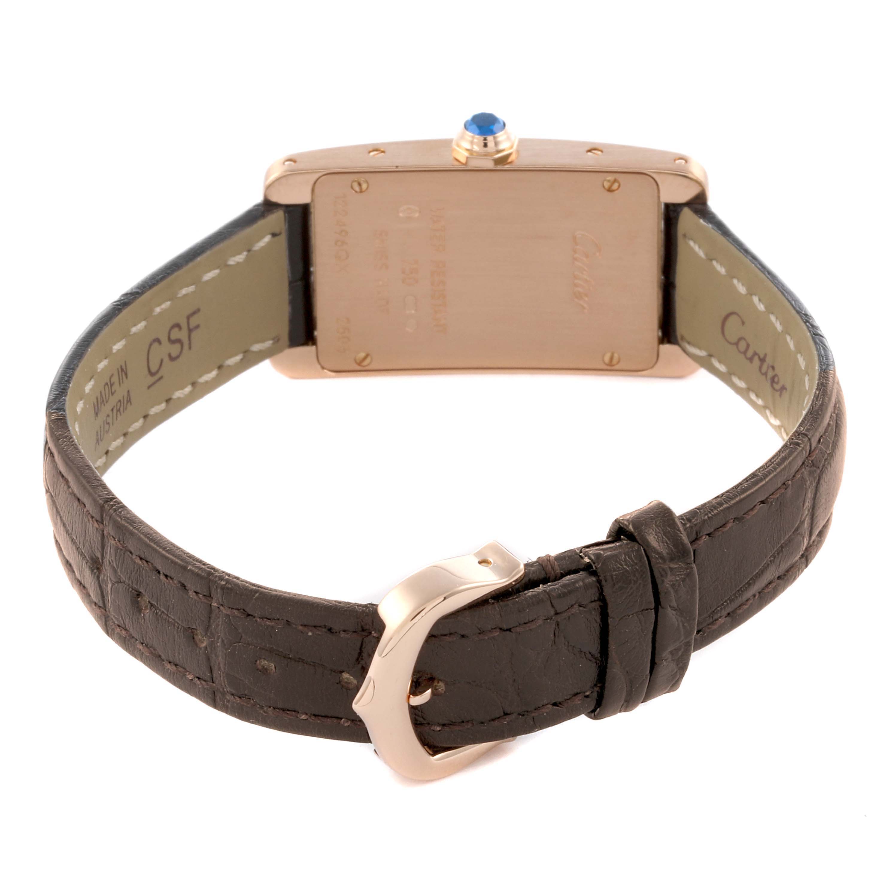The Cartier Tank Americaine W2607456 Women's Rose Gold Silver Dial W2607456 Women's Rose Gold Silver Dial watch is shown from the back, highlighting the case back and leather strap with buckle.