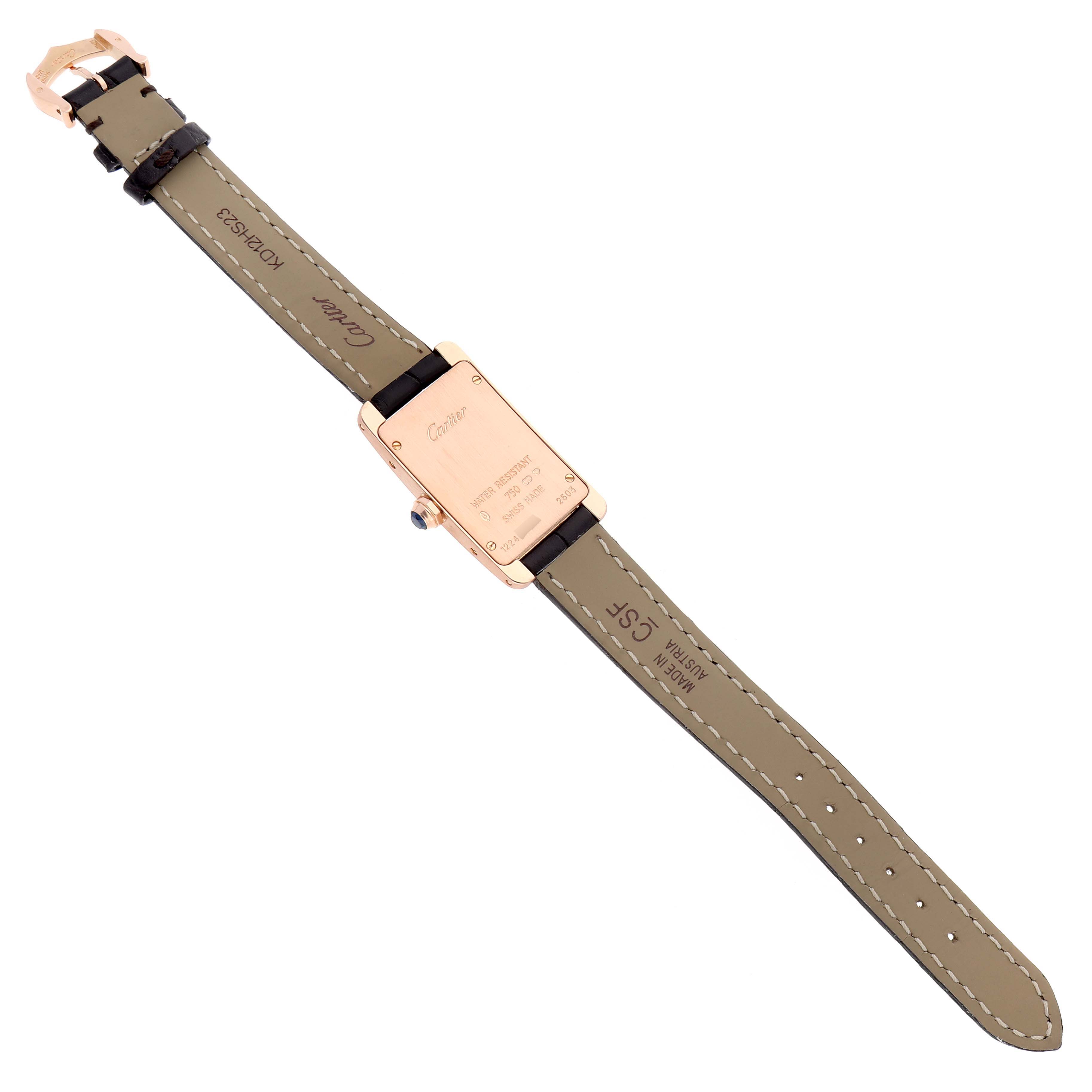 The image shows the back of a Cartier Tank Americaine W2607456 Women's Rose Gold Silver Dial W2607456 Women's Rose Gold Silver Dial watch, including the strap, buckle, and case back.