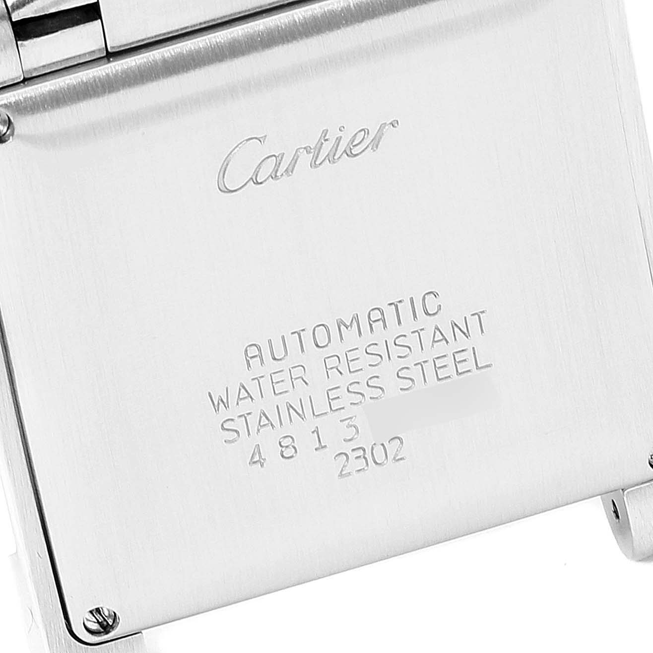 Close-up of the case back of the Cartier Tank Francaise W51002Q3 Men's Stainless Steel Silver Dial W51002Q3 Men's Stainless Steel Silver Dial watch, showing the branding and details like "Automatic" and "Water Resistant".