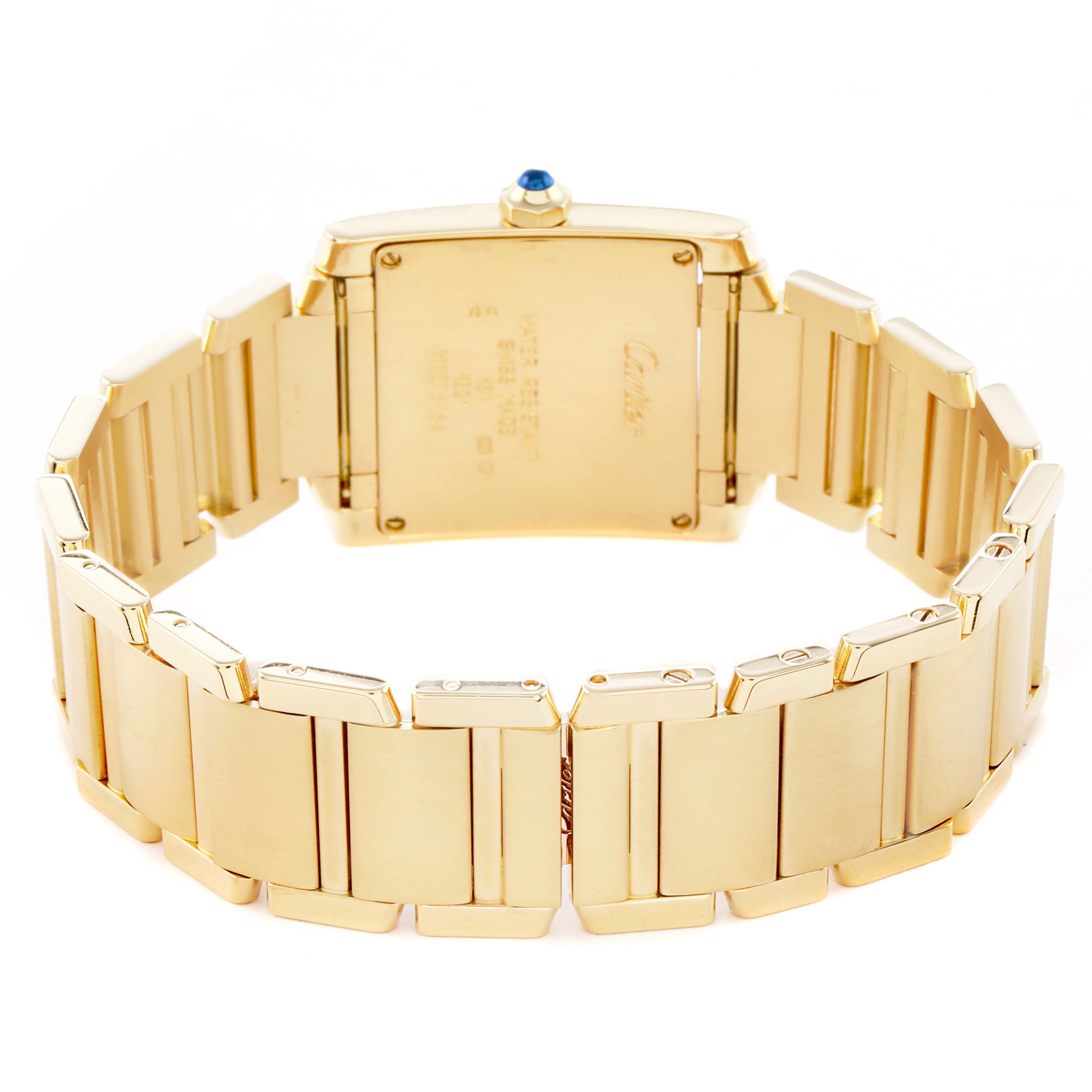 The image shows the back view of a Cartier Tank Française watch, highlighting its gold bracelet and clasp.