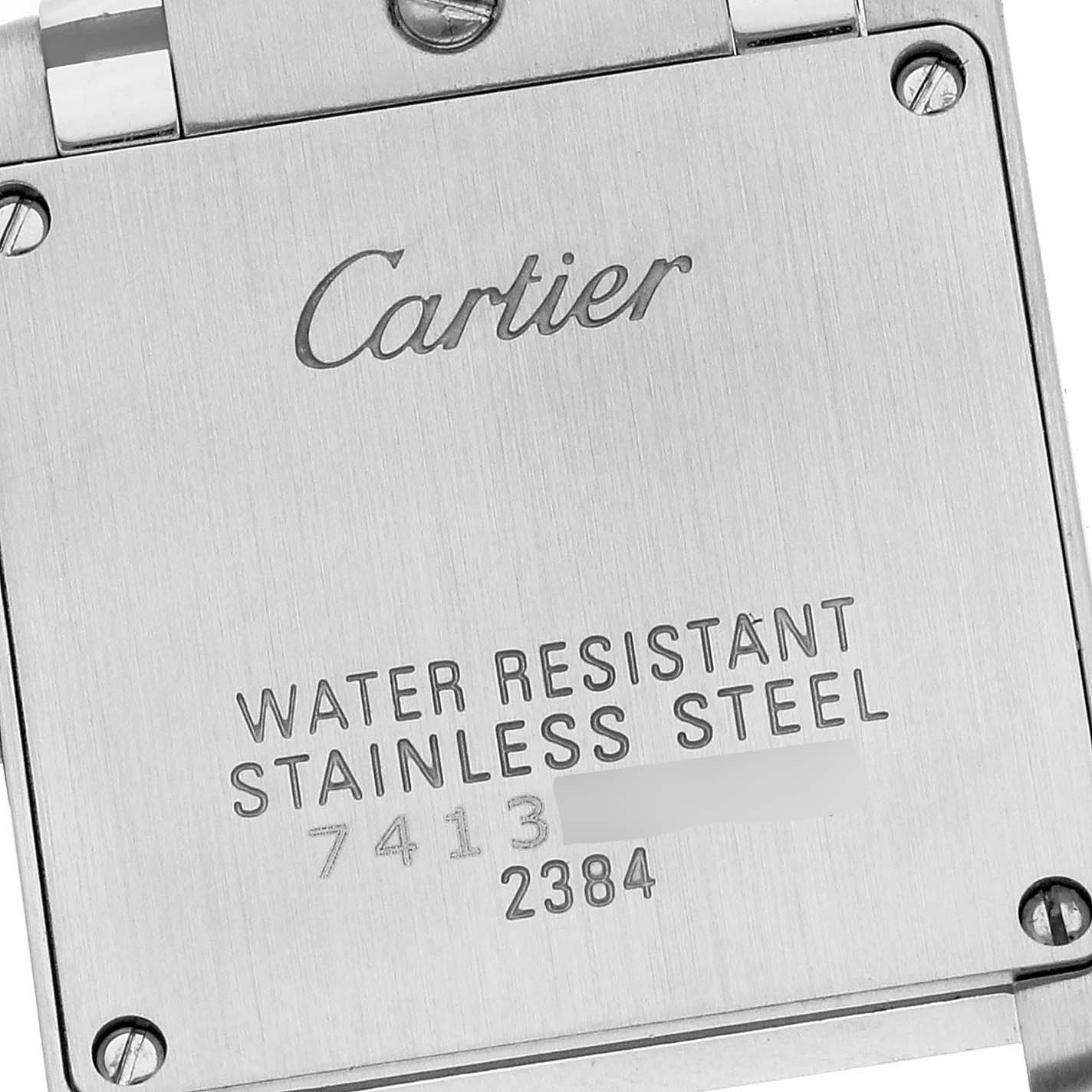 The image shows the case back of a Tank Francaise model by Cartier, highlighting the branding and water resistance information.