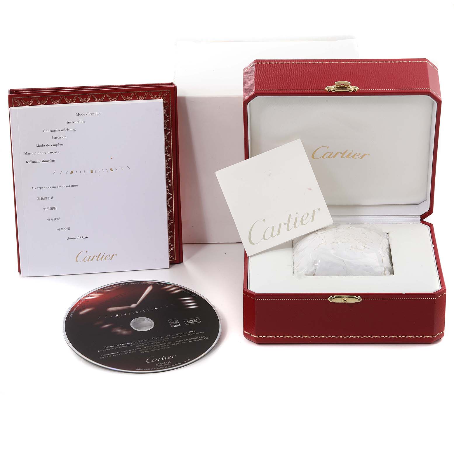 The image shows a Cartier Tank Francaise W51028Q3 Women's Stainless Steel Mother of Pearl Dial W51028Q3 Women's Stainless Steel Mother of Pearl Dial watch packaging, including its box, manual, and a CD.