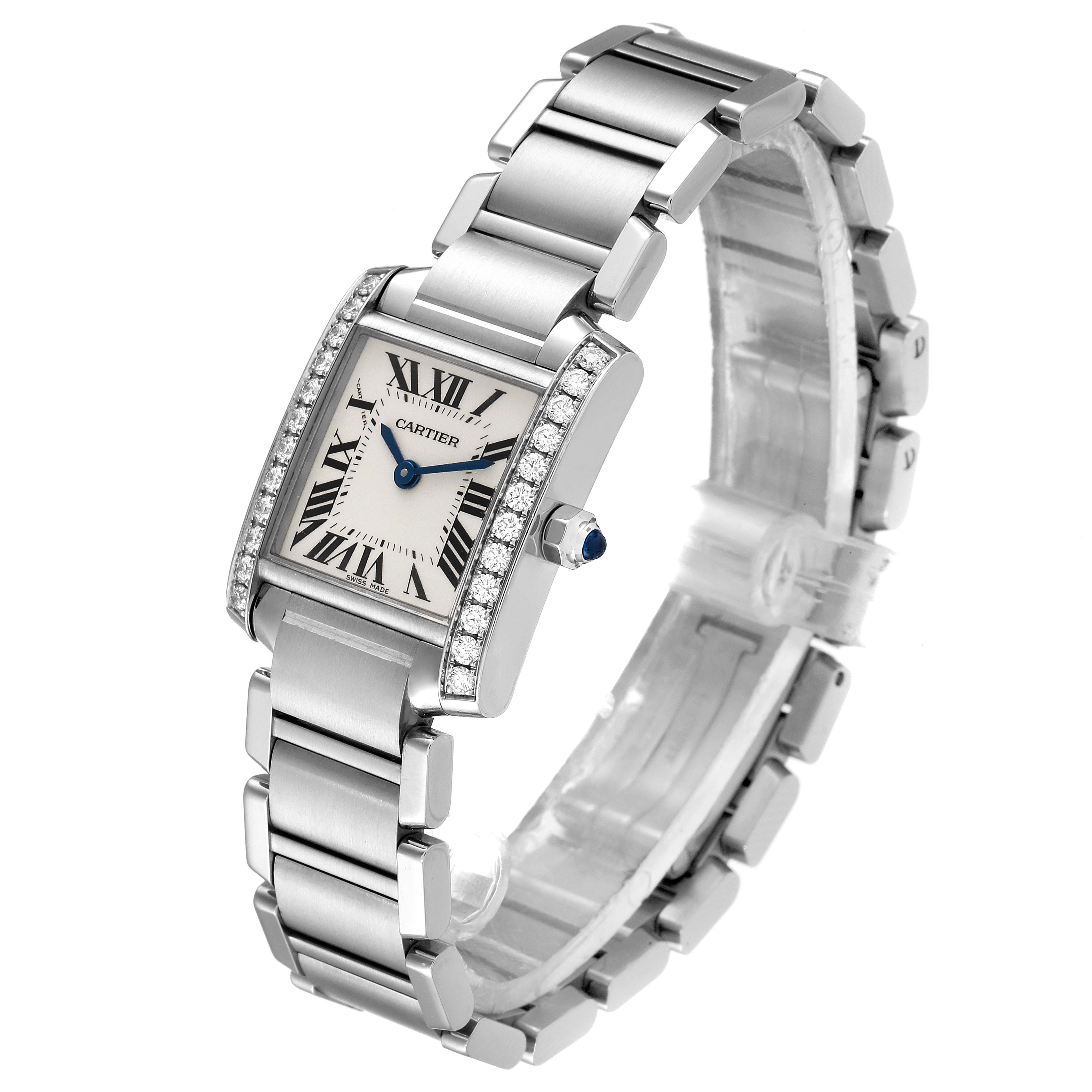 The Cartier Tank Française watch is shown at a three-quarter angle, displaying its rectangular face, bracelet, and diamond-set bezel.