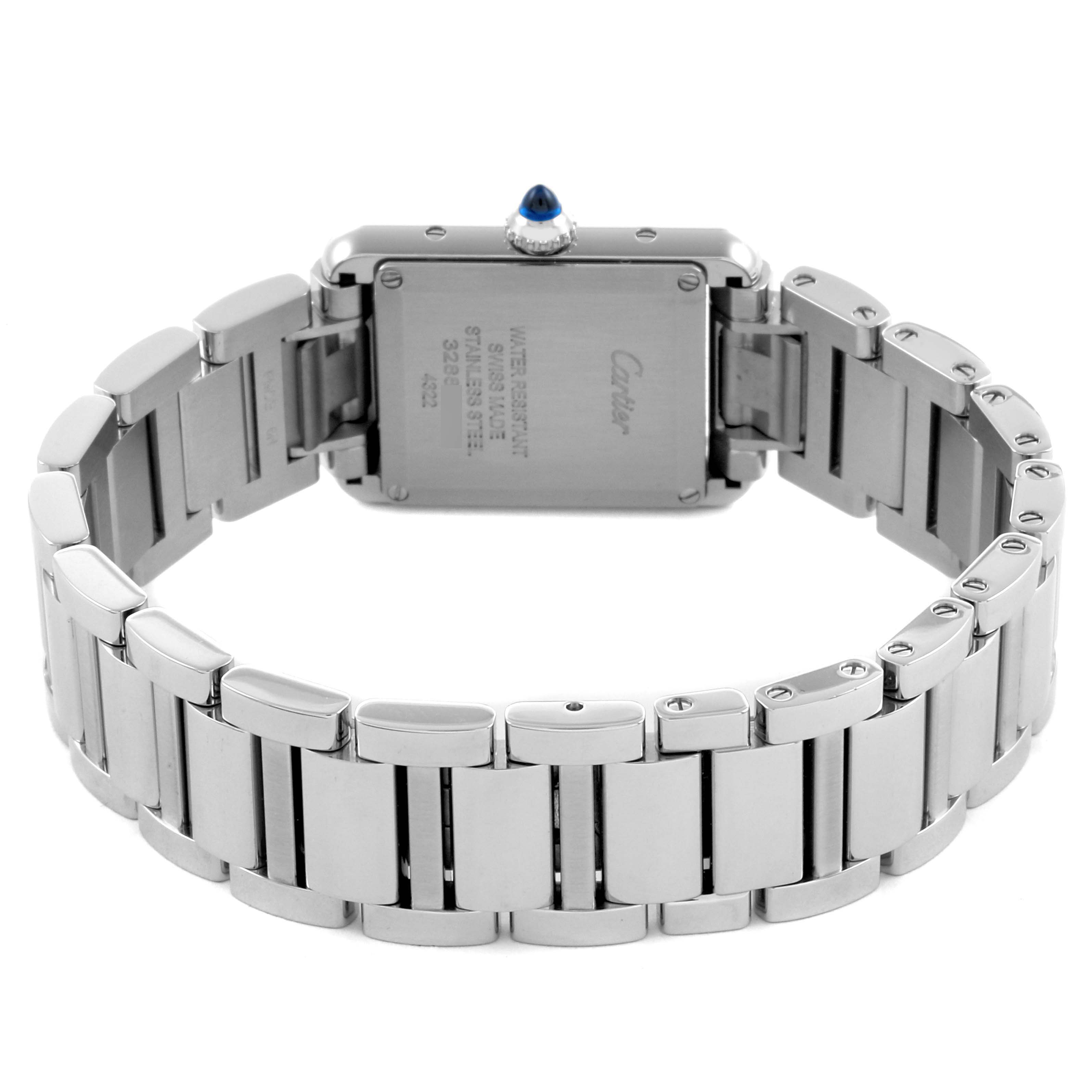 The image shows the back of a Cartier Tank Must WSTA0051 Women's Stainless Steel Silver Dial WSTA0051 Women's Stainless Steel Silver Dial watch, highlighting the case back and stainless steel bracelet.