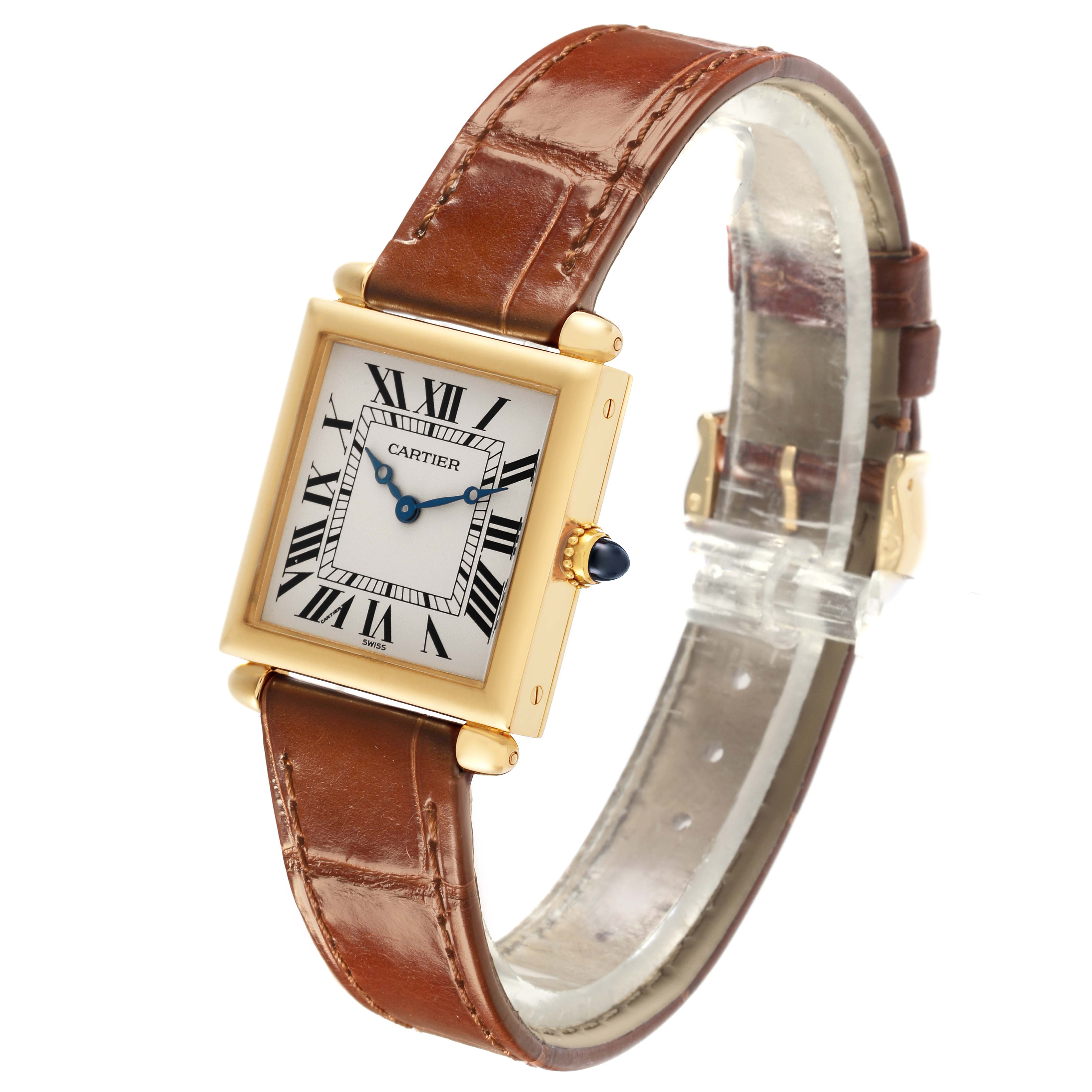 The Cartier Tank Obus W1512256 Women's Yellow Gold Silver Dial W1512256 Women's Yellow Gold Silver Dial watch is shown at an angle highlighting the dial, case, crown, and brown leather strap.