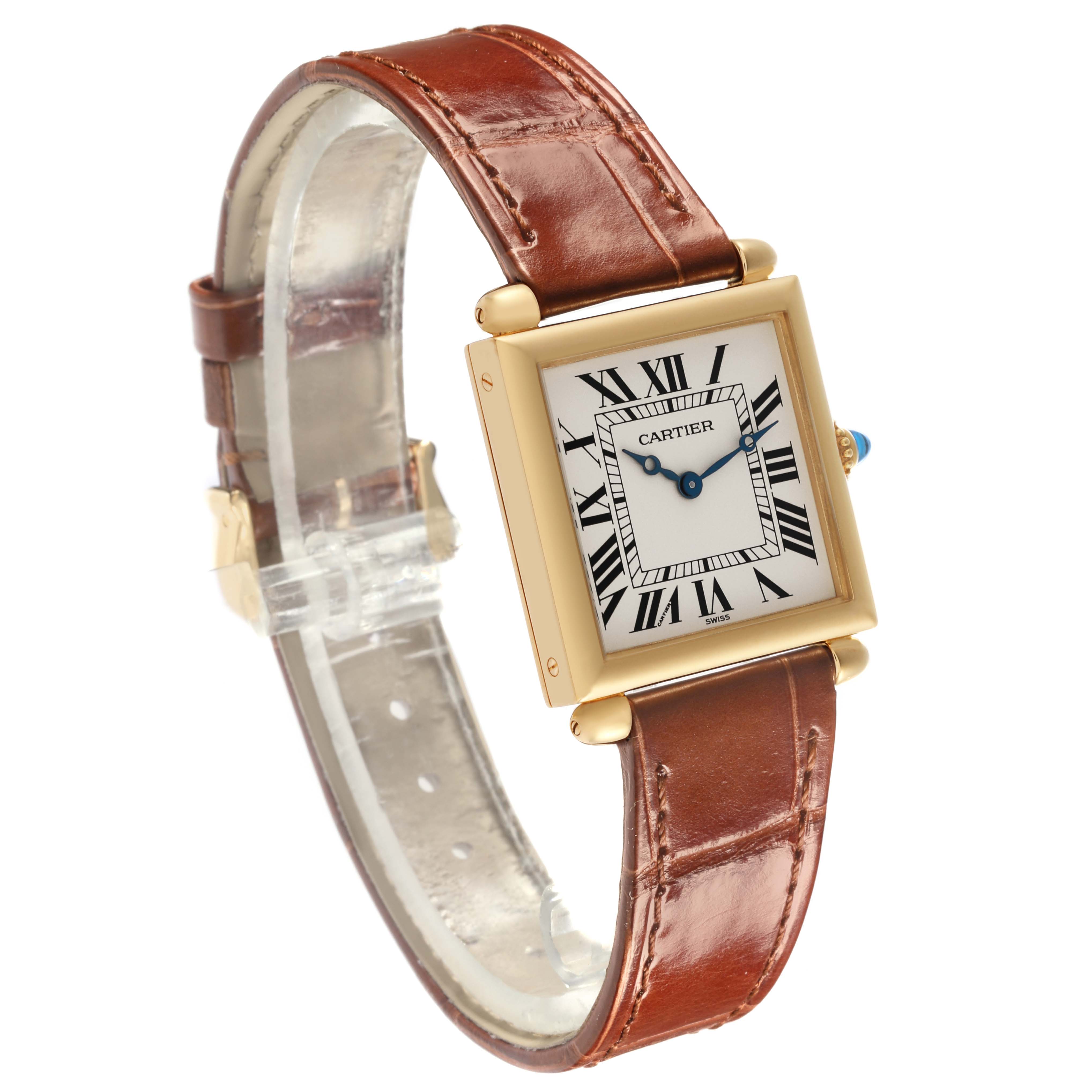 The Cartier Tank Obus W1512256 Women's Yellow Gold Silver Dial W1512256 Women's Yellow Gold Silver Dial watch is shown at a three-quarter angle, displaying the face, case, crown, and leather strap.