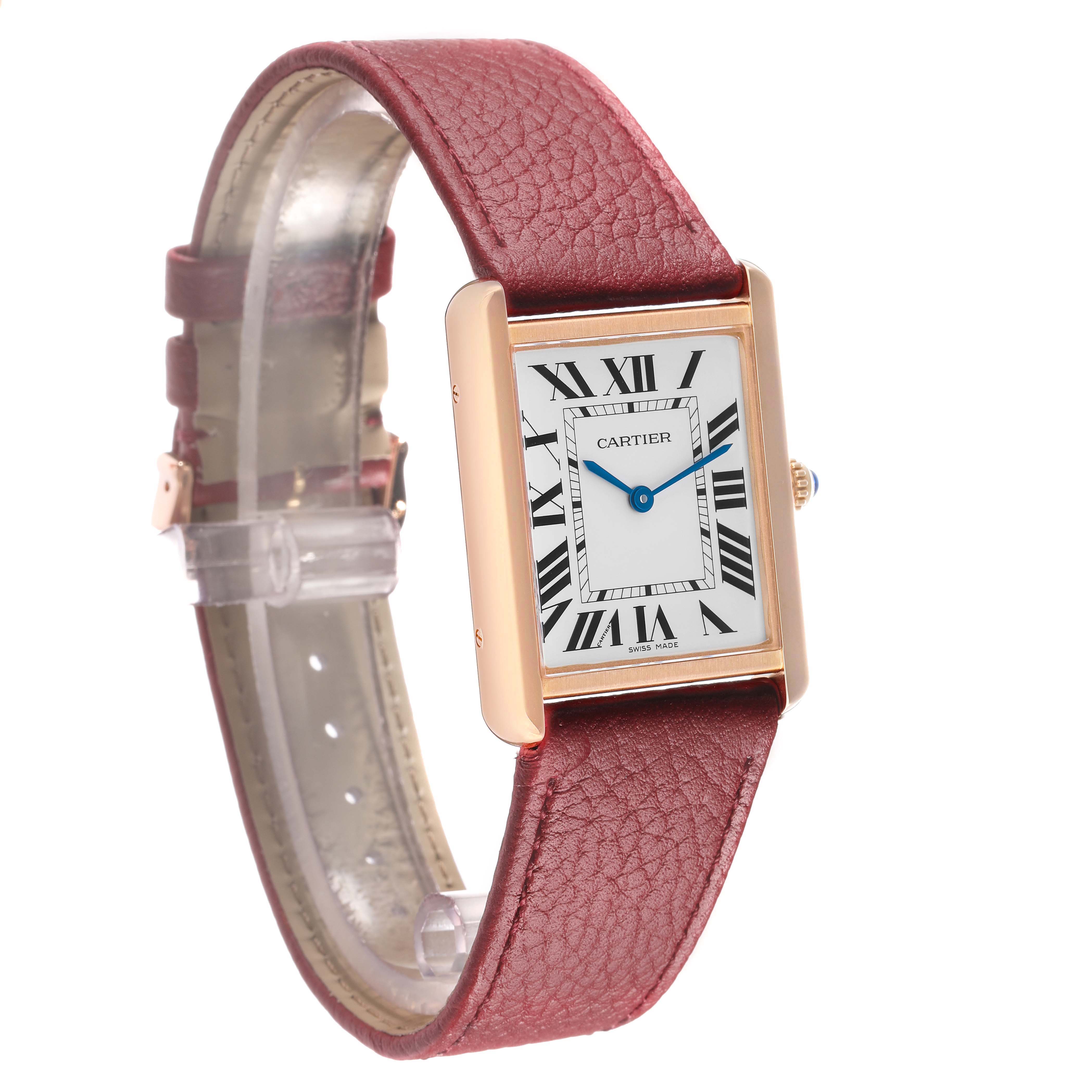 The Cartier Tank Solo W5200025 Men's Rose Gold Silver Dial watch is shown at an angle highlighting the rectangular face, gold casing, and red leather strap.