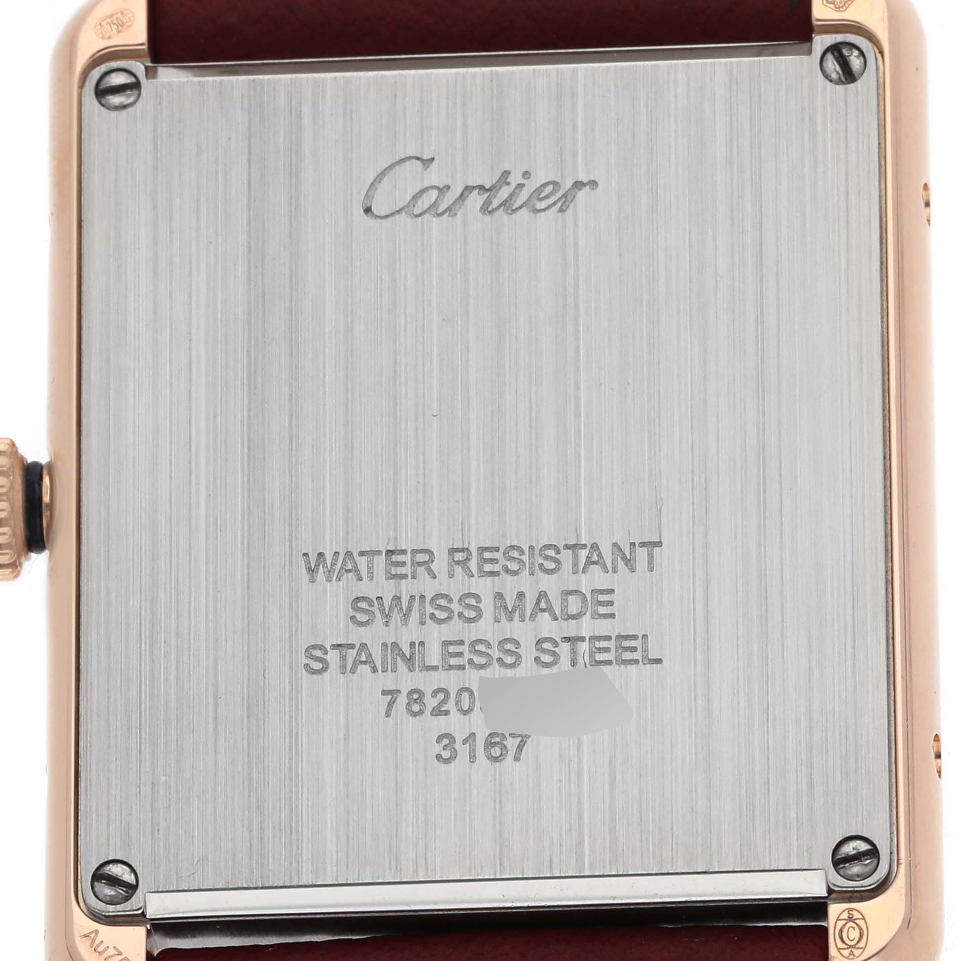 The image displays the back of the Cartier Tank Solo W5200025 Men's Rose Gold Silver Dial watch, showing the brand name, materials, and model details.