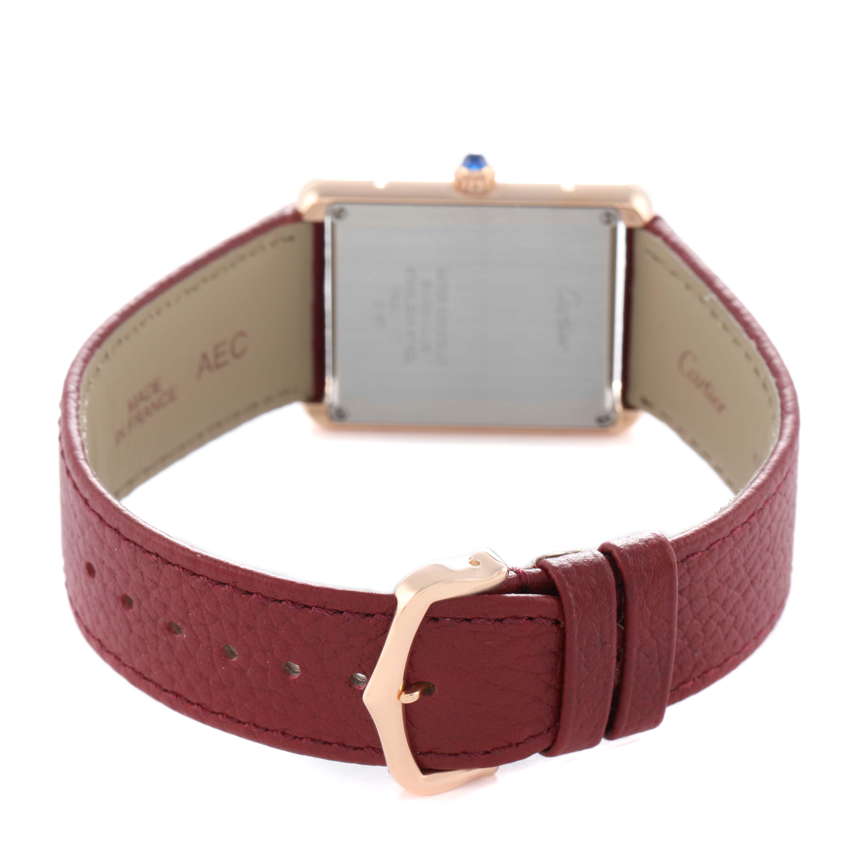 The image shows the back view of a Cartier Tank Solo W5200025 Men's Rose Gold Silver Dial watch, highlighting the case back, strap, and buckle.