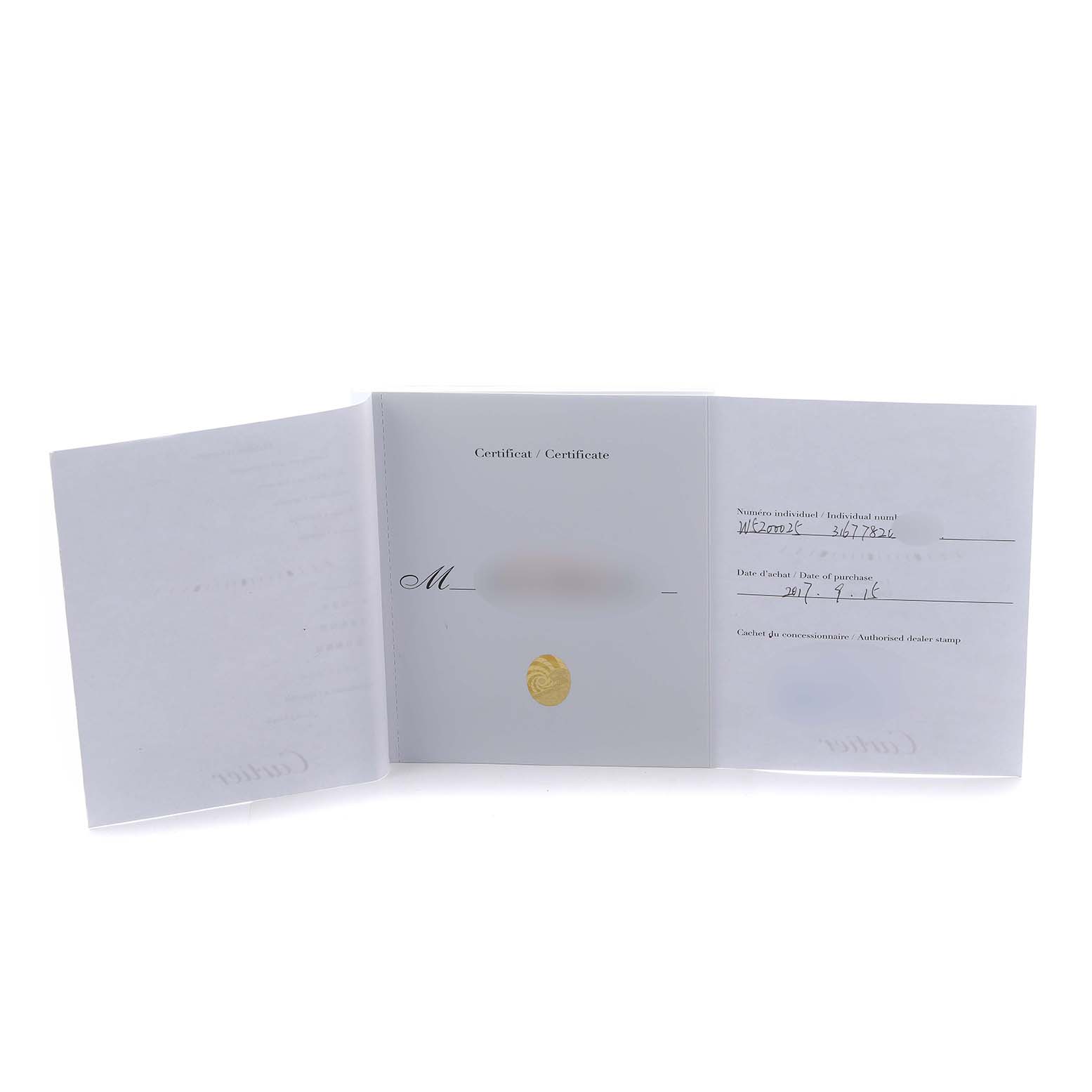 This image shows the open warranty and certificate documents for a Cartier Tank Solo W5200025 Men's Rose Gold Silver Dial watch.