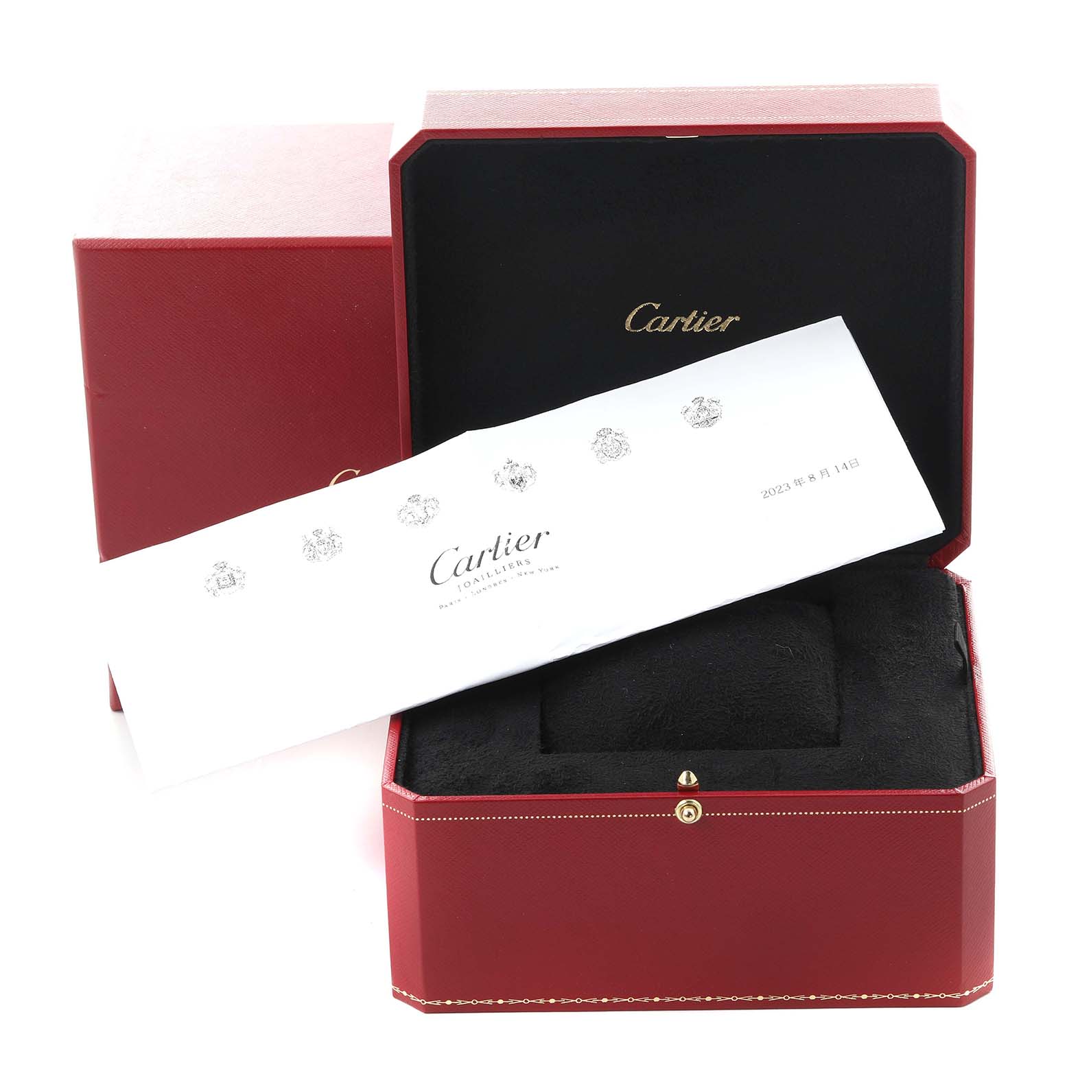 The image shows the Cartier Tonneau W1546351 Men's Platinum Silver Dial W1546351 Men's Platinum Silver Dial watch box and documents, with the red box open displaying the inner cushioned section.