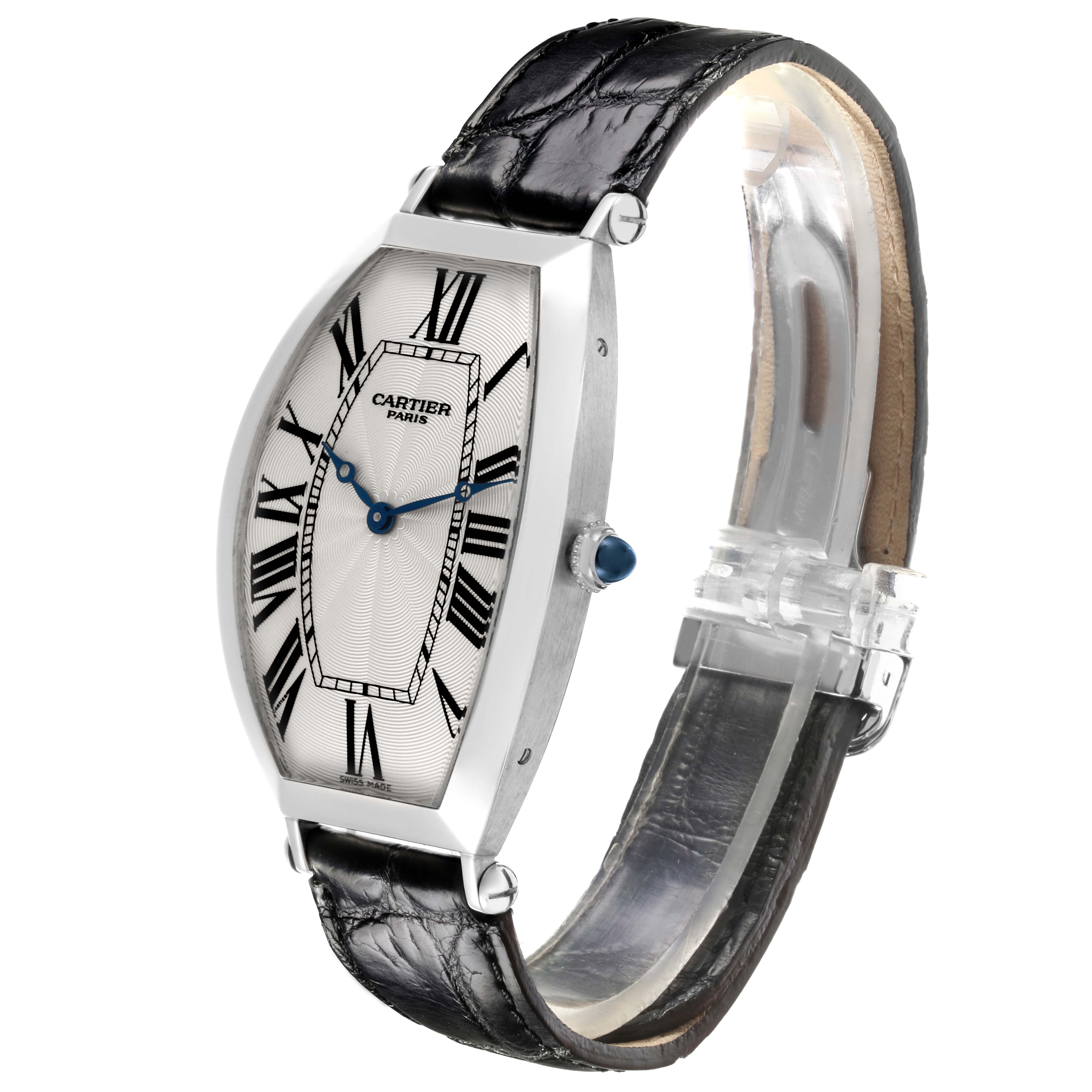 The Cartier Tonneau W1546351 Men's Platinum Silver Dial W1546351 Men's Platinum Silver Dial watch is shown at a three-quarter angle, highlighting the dial, case, and strap.