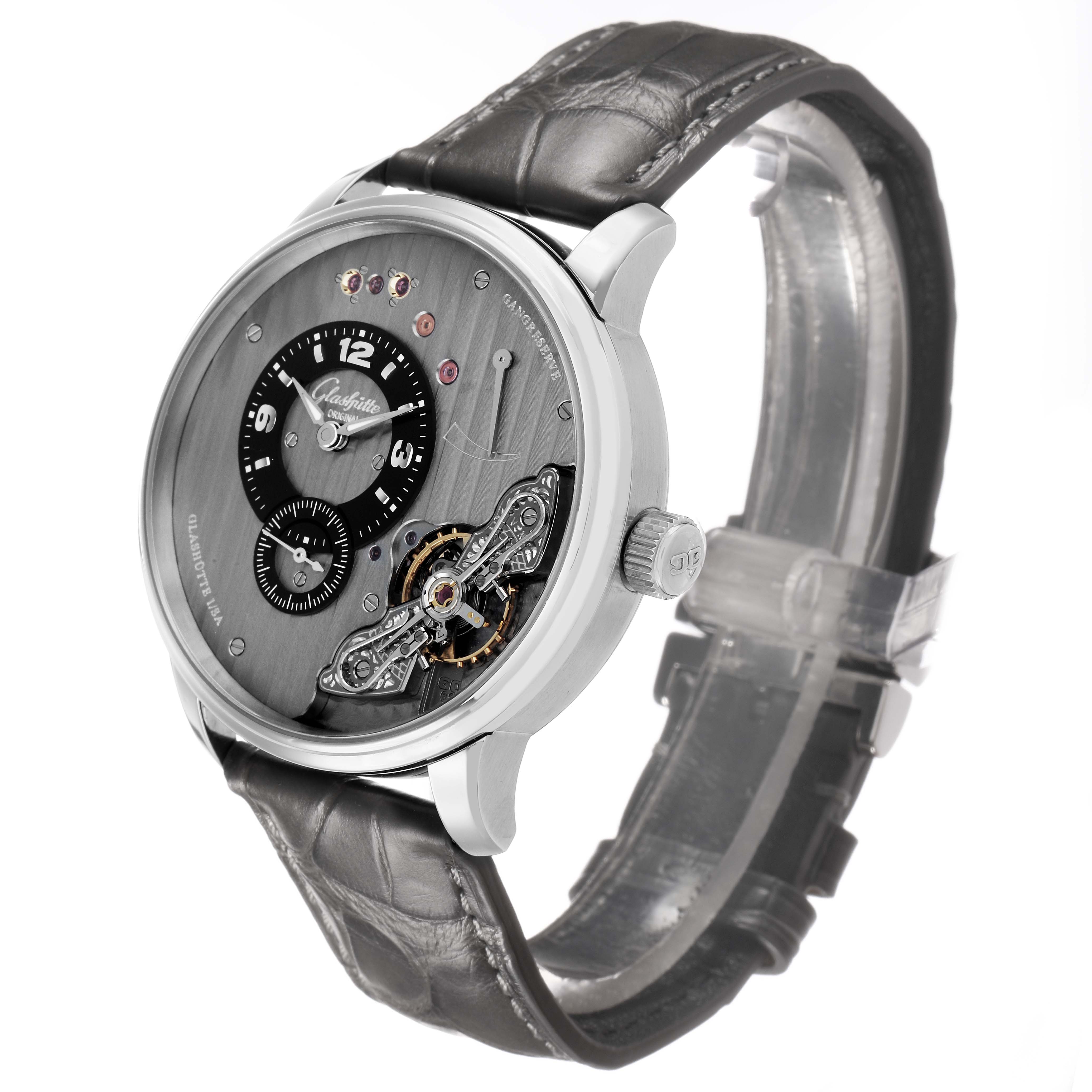 The Glashutte Original 1-66-06-04-22-05 Men's Stainless Steel Grey Dial watch is shown at a front-three-quarter angle, displaying its intricate dial and leather strap.