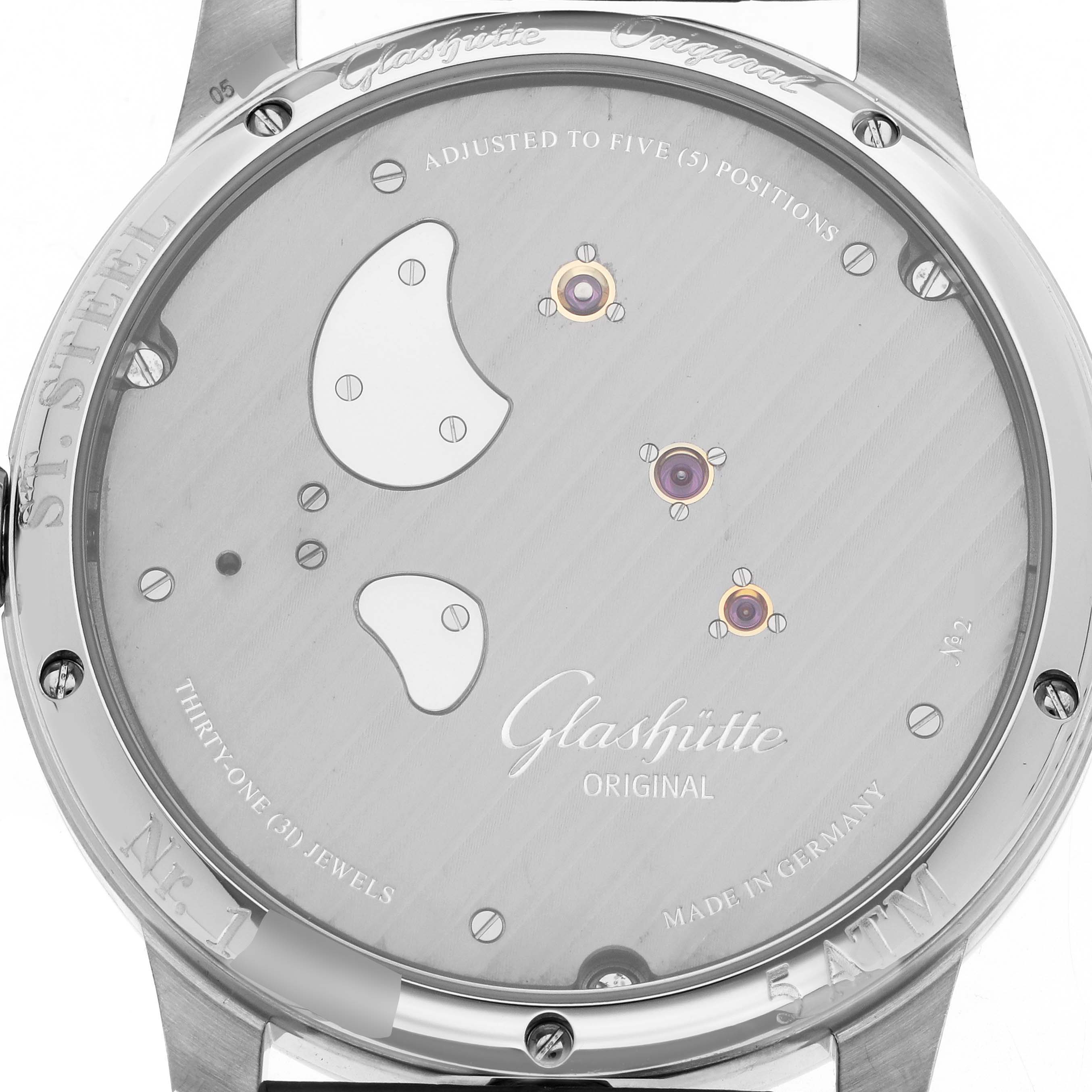 The image shows the back case of a Glashütte Original watch, highlighting the movement and jewel adjustments.
