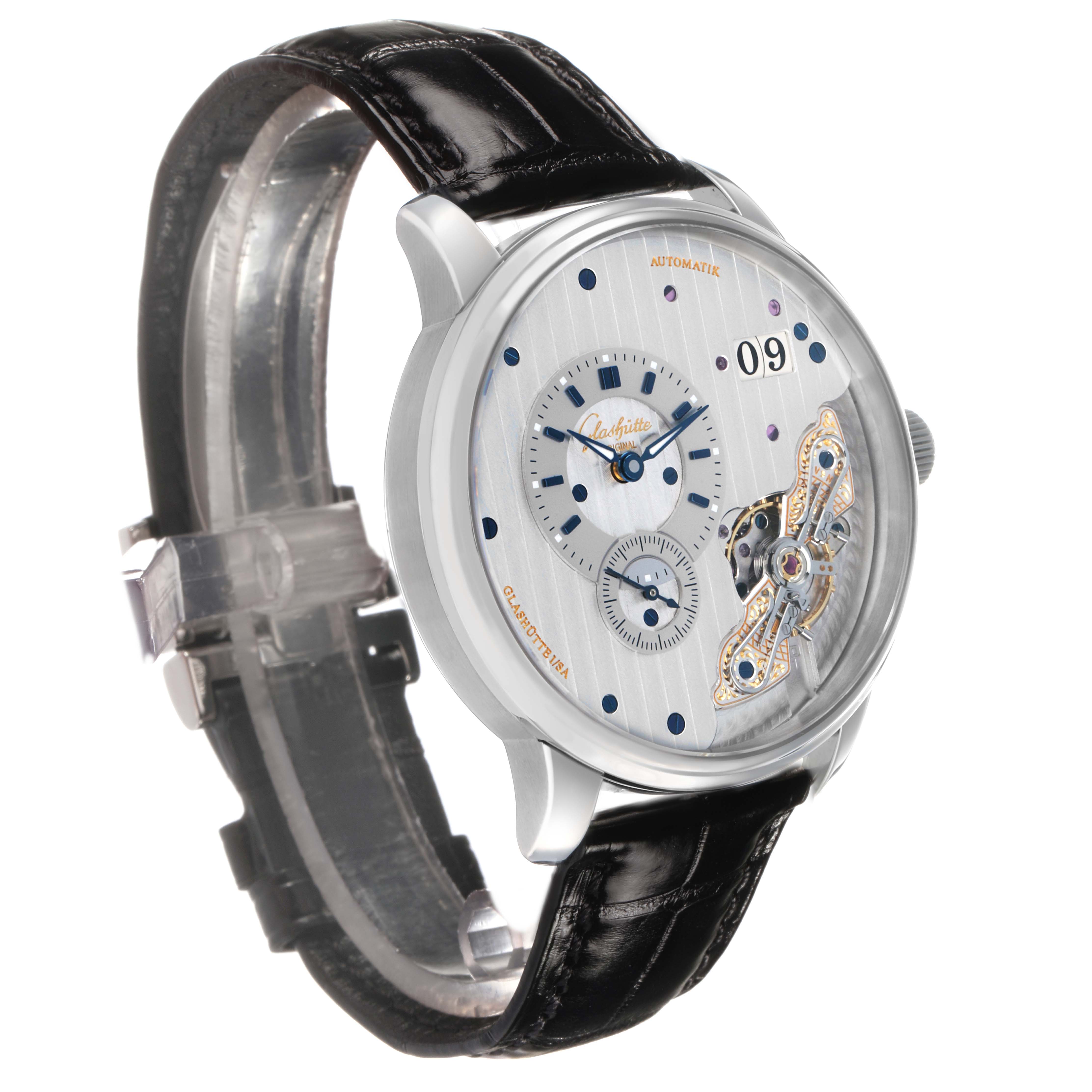 The Glashütte Original watch is shown at a slight side angle, displaying the dial, strap, and part of the case.