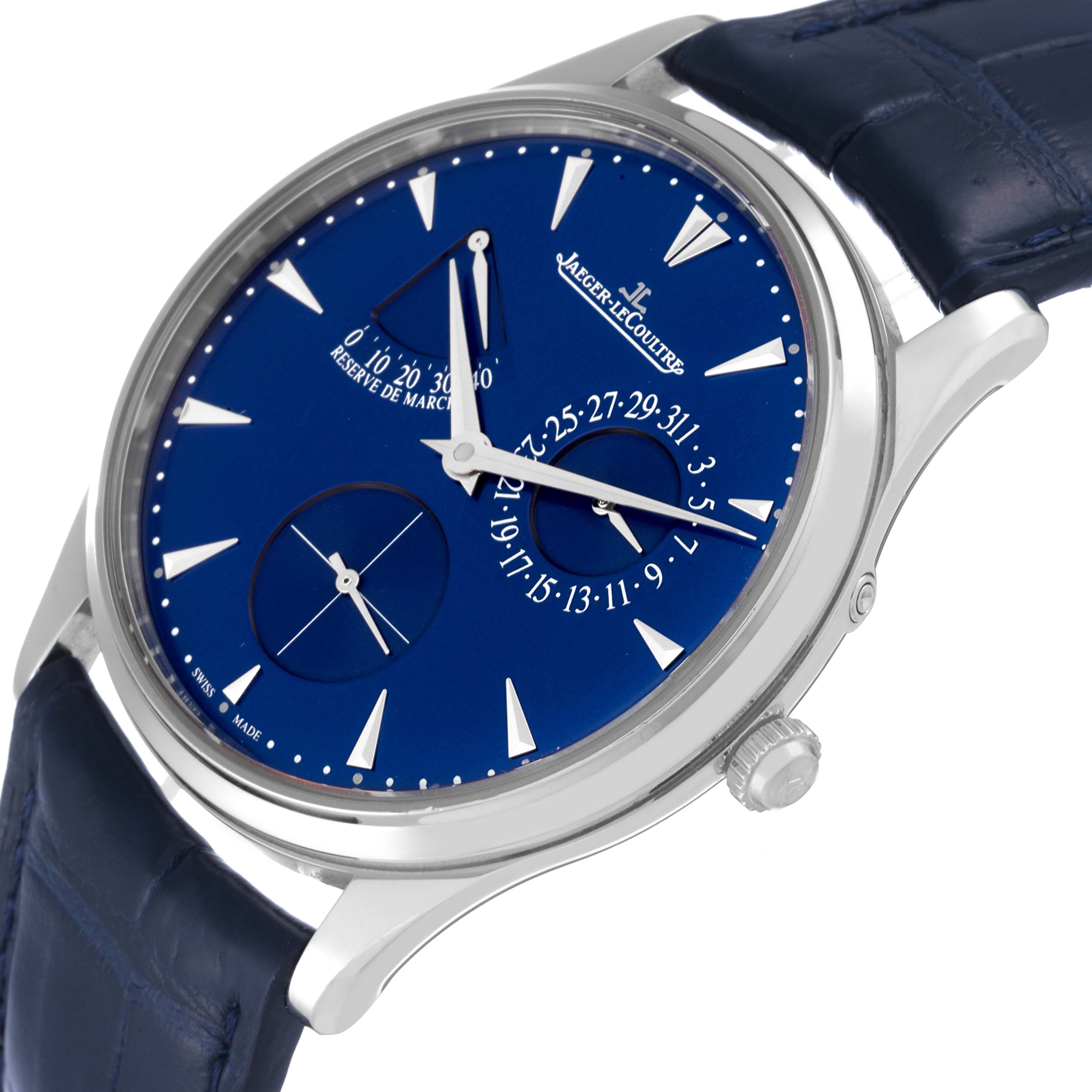 The image shows a Jaeger-LeCoultre Master model watch from a tilted side angle, highlighting the blue dial, sub-dials, and crown.