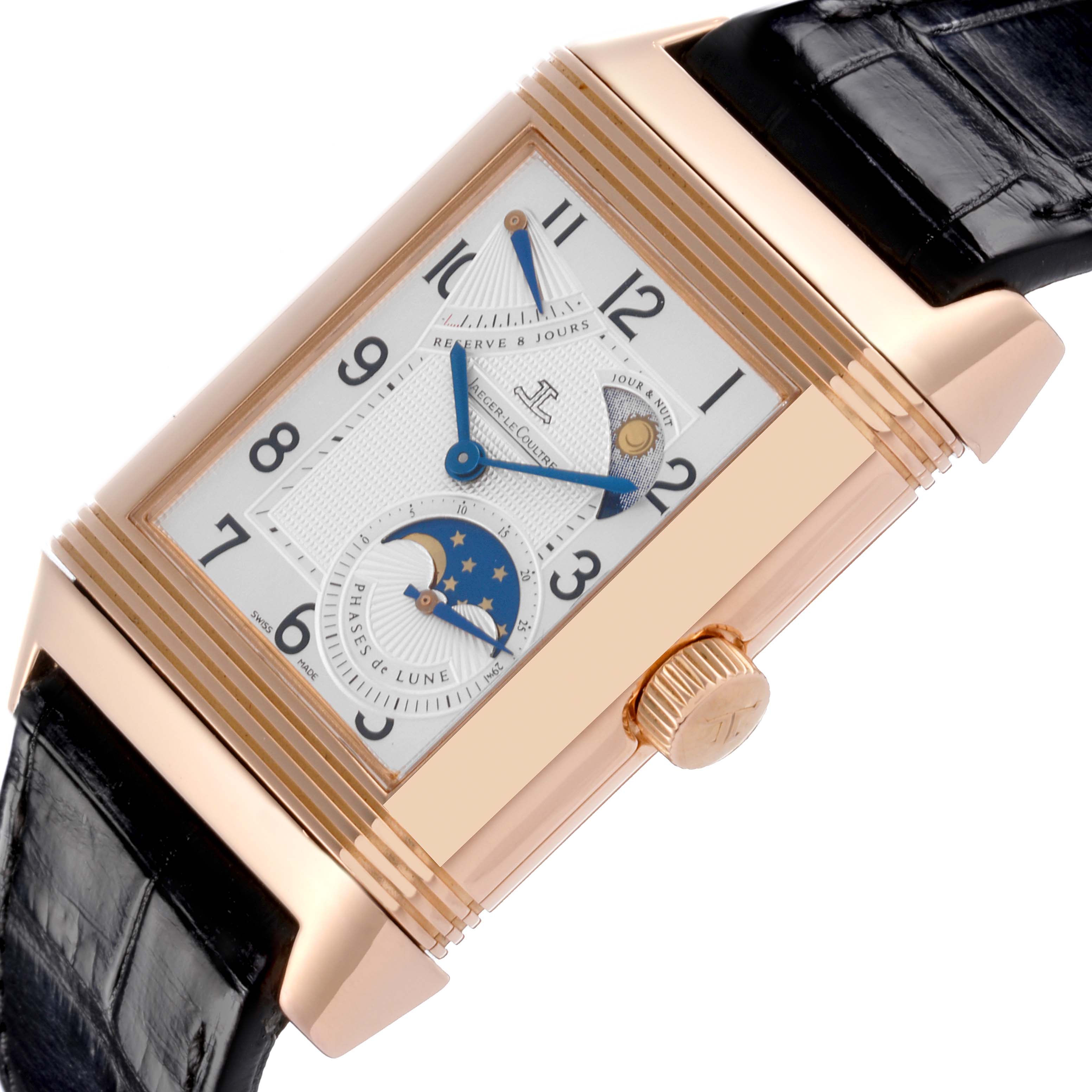The Jaeger-LeCoultre Reverso watch is shown at an angle displaying the face, crown, and part of the black strap.