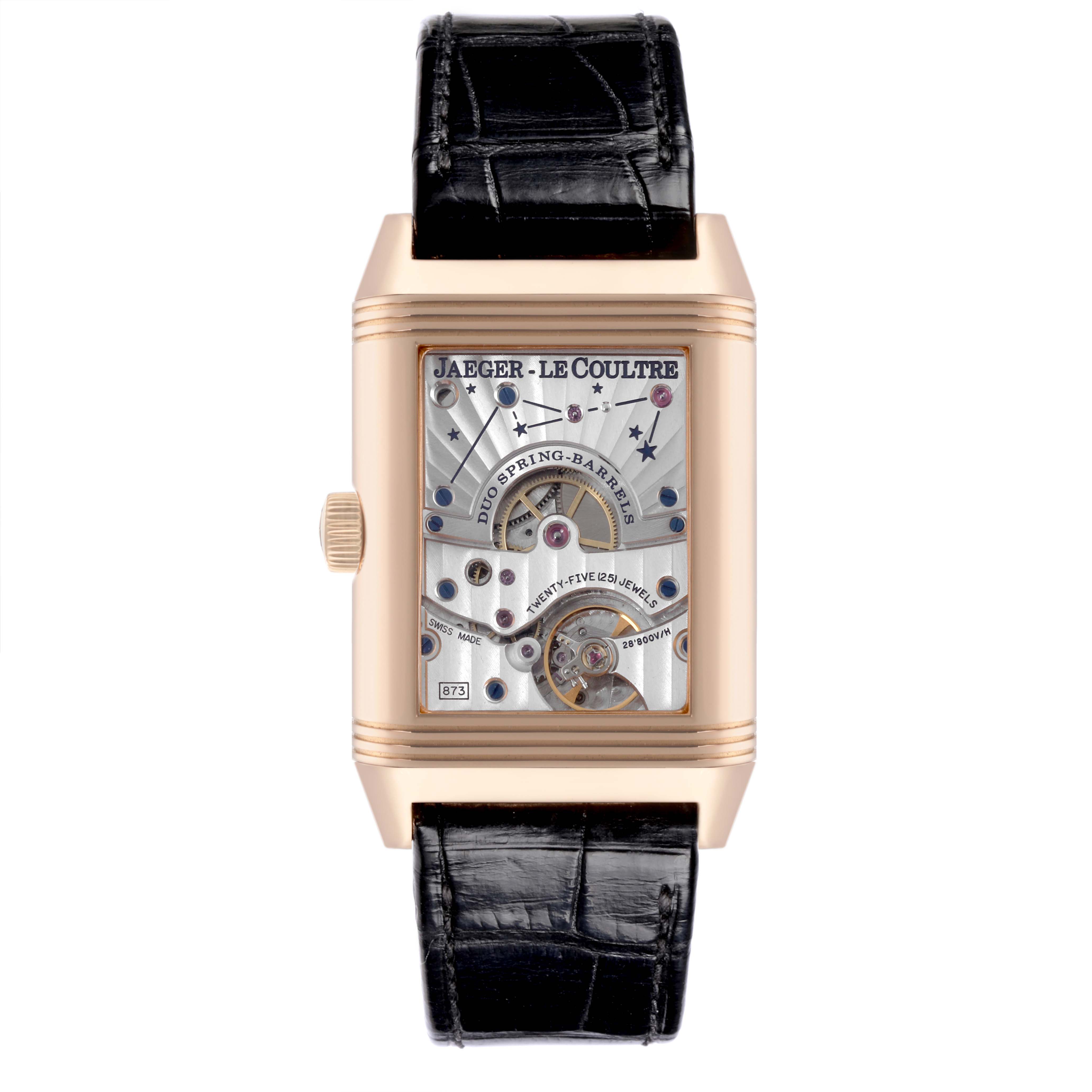 The Jaeger LeCoultre Reverso Q3042420 Men's Rose Gold Silver Dial Q3042420 Men's Rose Gold Silver Dial watch is shown from the front, showcasing its intricate movement and a black leather strap.