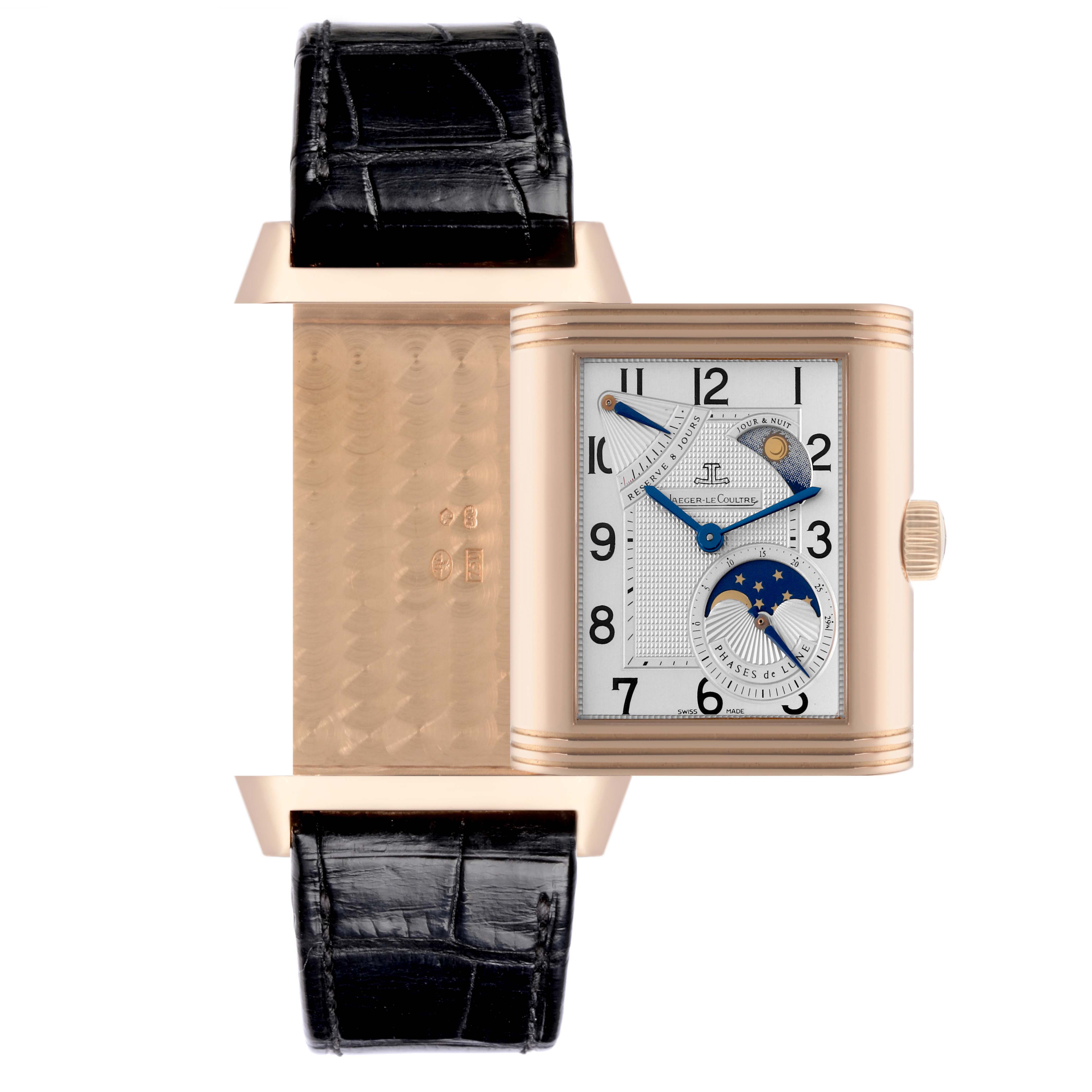 The image shows a Jaeger-LeCoultre Reverso watch face with its case partially flipped, revealing the back panel.