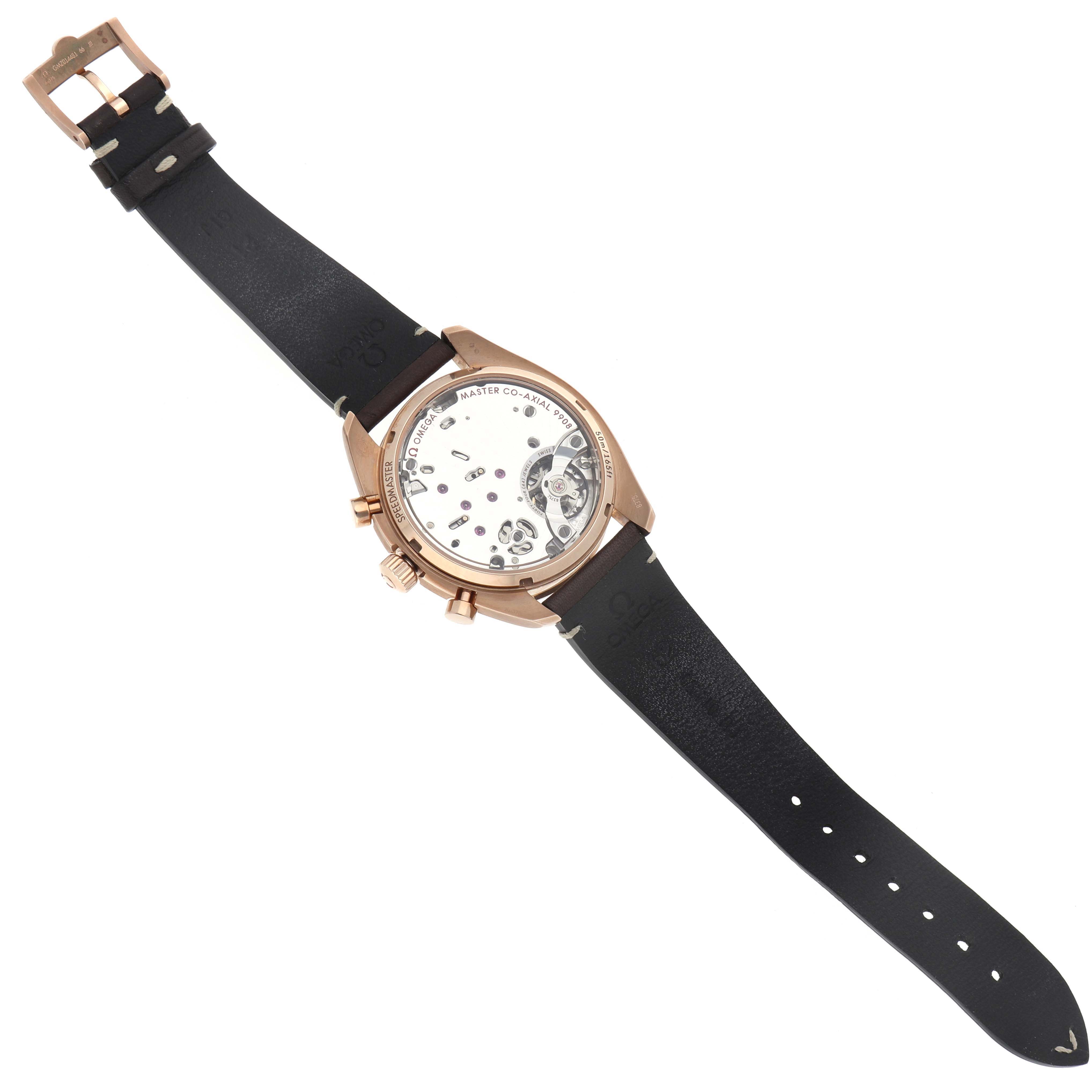 The Omega Speedmaster 329.92.43.51.10.001 Men's Rose Gold Brown Dial watch is shown from the back, displaying its open case back and leather strap with rose gold accents.