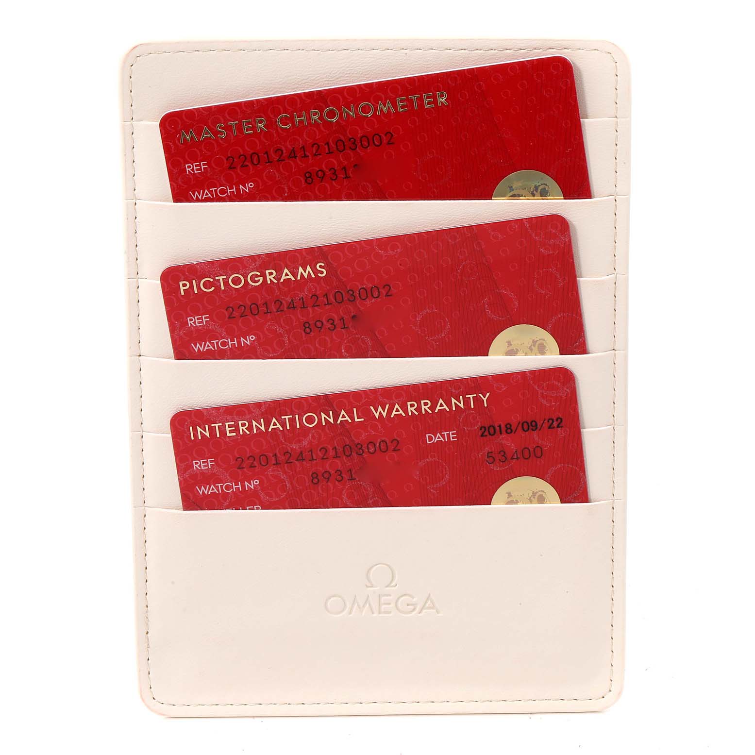 The image shows an Omega Aqua Terra 220.12.41.21.03.002 Men's Stainless Steel Blue Dial 220.12.41.21.03.002 Men's Stainless Steel Blue Dial model's warranty cards in a white Omega-branded holder.