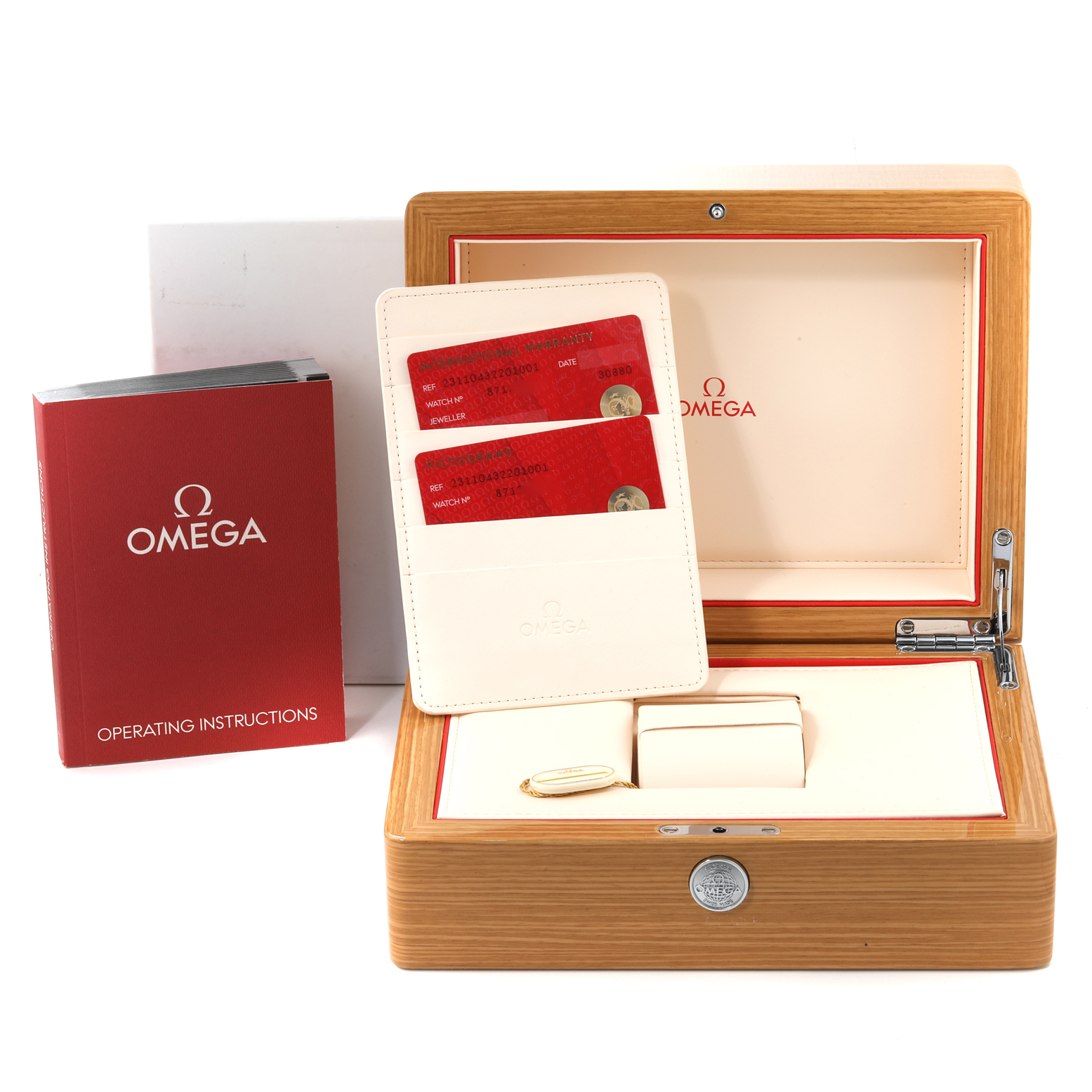 The image shows the packaging and accessories for the Omega Aqua Terra 231.10.43.22.01.001 Men's Stainless Steel Black Dial 231.10.43.22.01.001 Men's Stainless Steel Black Dial model, including the box, operating instructions, cards, and cardholder.