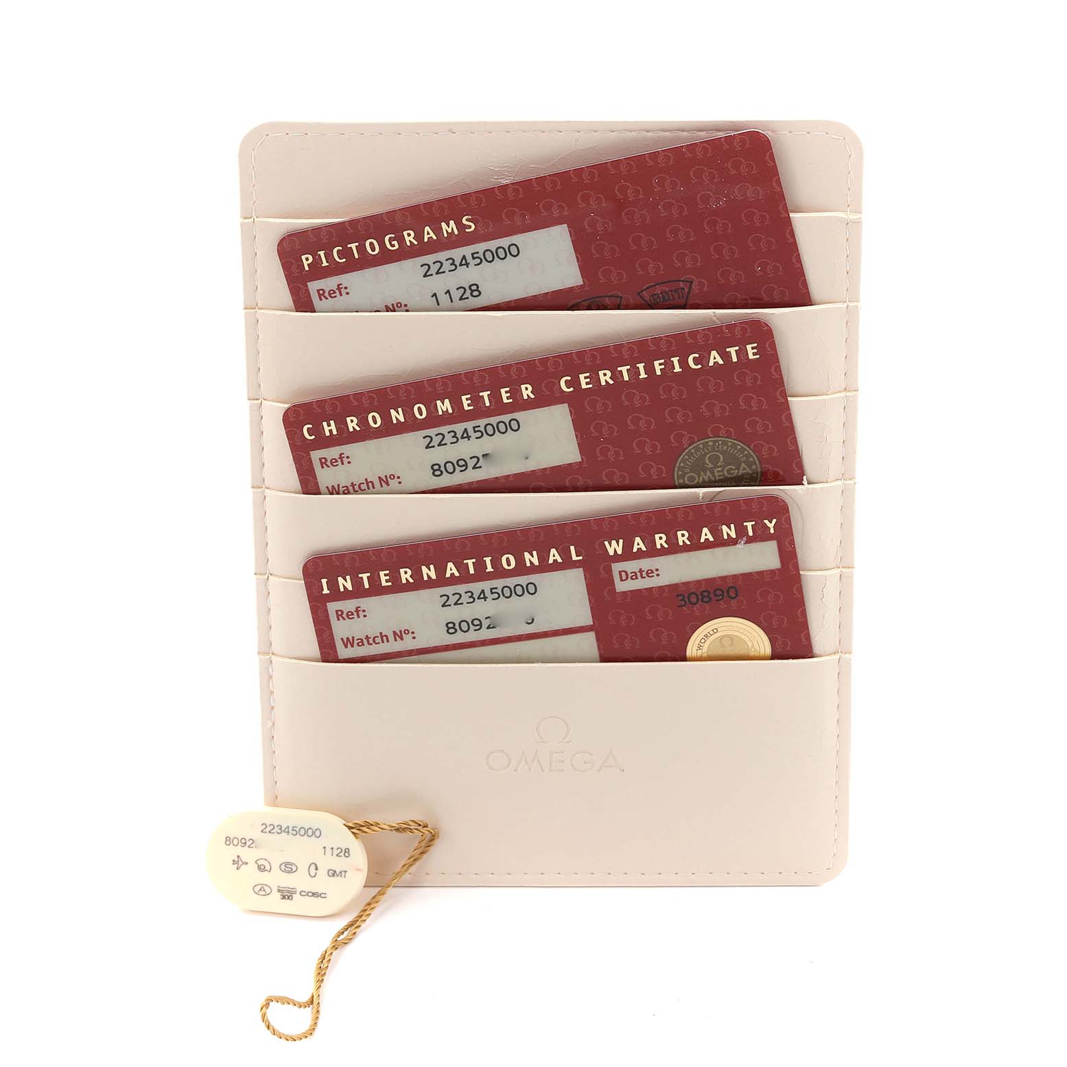 The image shows warranty and certification cards for an Omega Seamaster 2234.50.00 Men
s Stainless Steel Black Dial 2234.50.00 Men
s Stainless Steel Black Dial, with an identification tag.