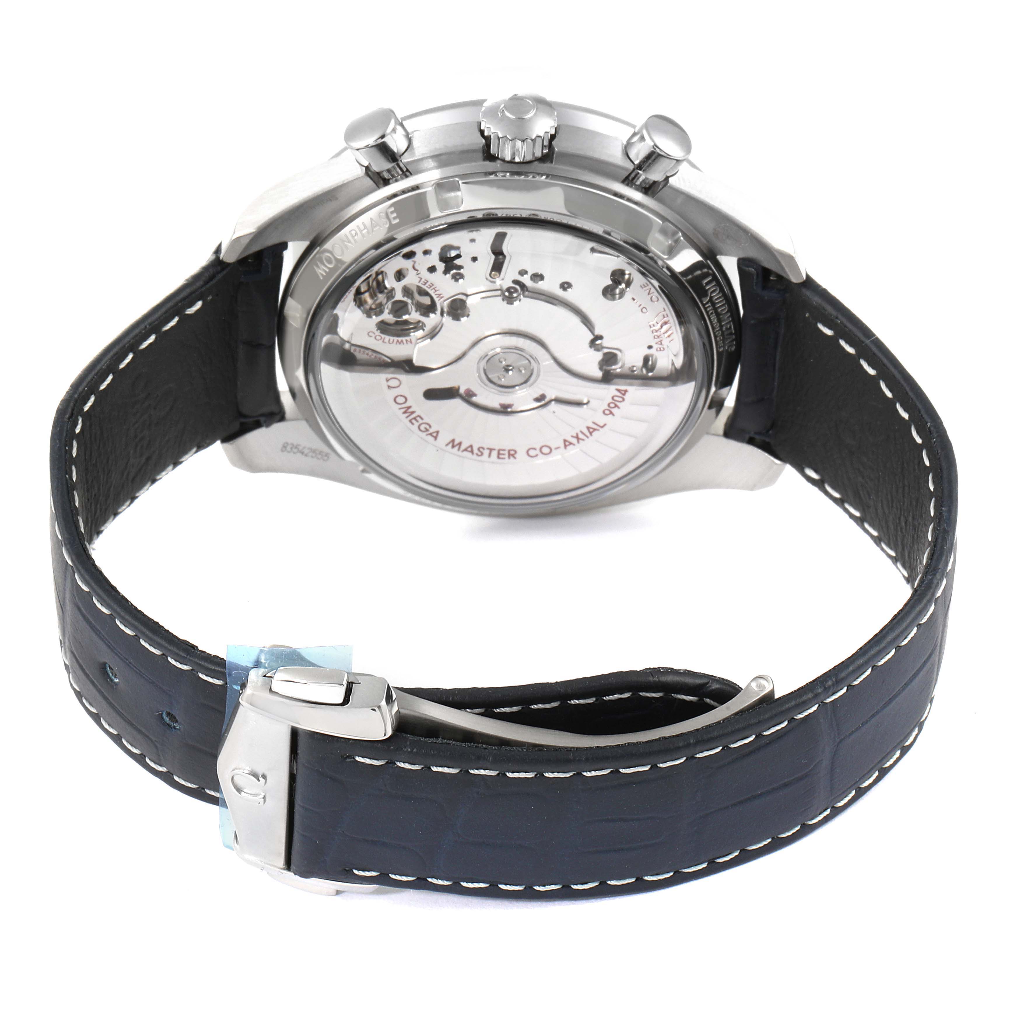 The image shows the back view of an Omega Speedmaster 304.33.44.52.03.001 Men's Stainless Steel Blue Dial 304.33.44.52.03.001 Men's Stainless Steel Blue Dial watch, displaying the movement and black leather strap with buckle.