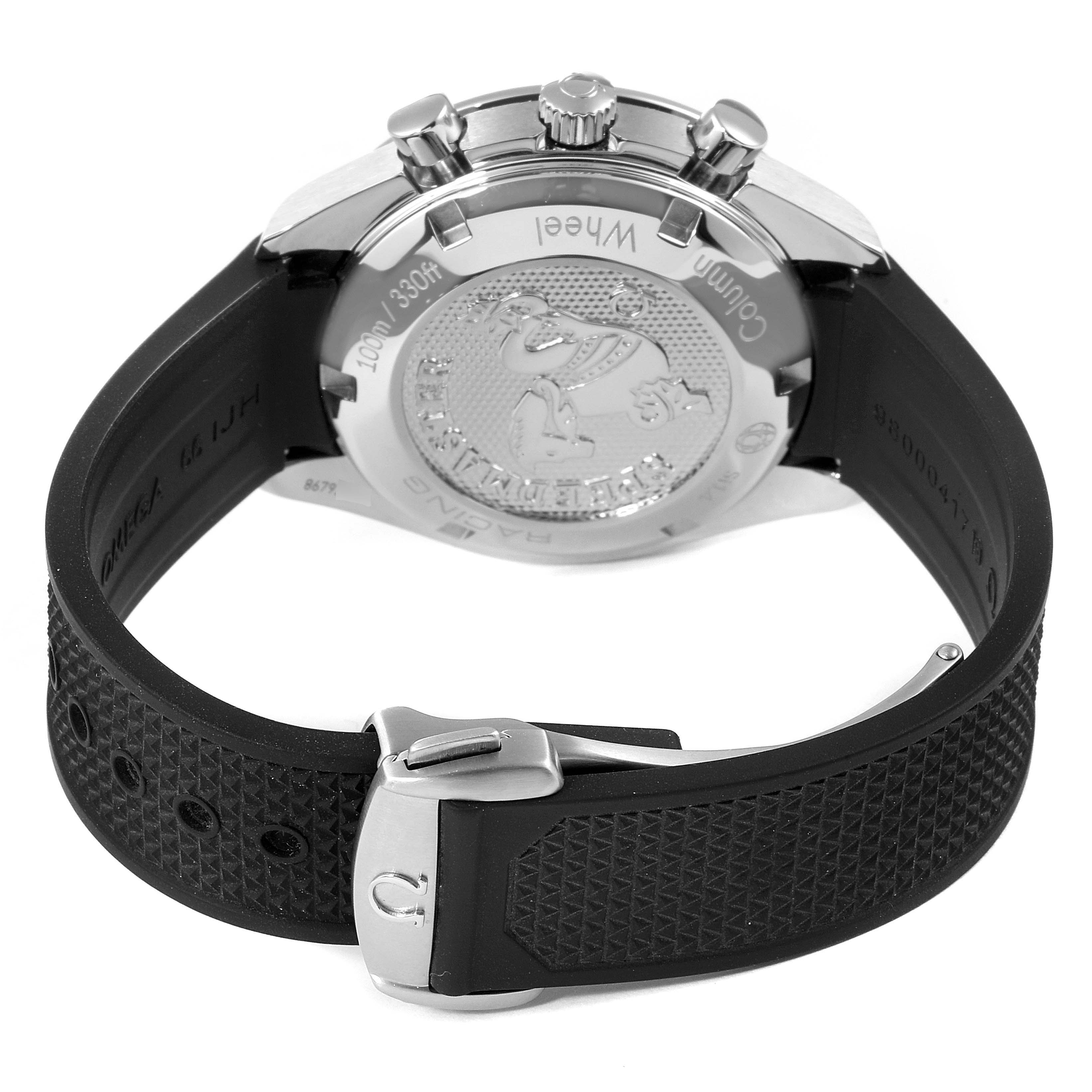 The image shows the back view of an Omega Speedmaster 326.32.40.50.06.001 Men's Stainless Steel Grey Dial 326.32.40.50.06.001 Men's Stainless Steel Grey Dial model with focus on the case back and the rubber strap with a clasp.