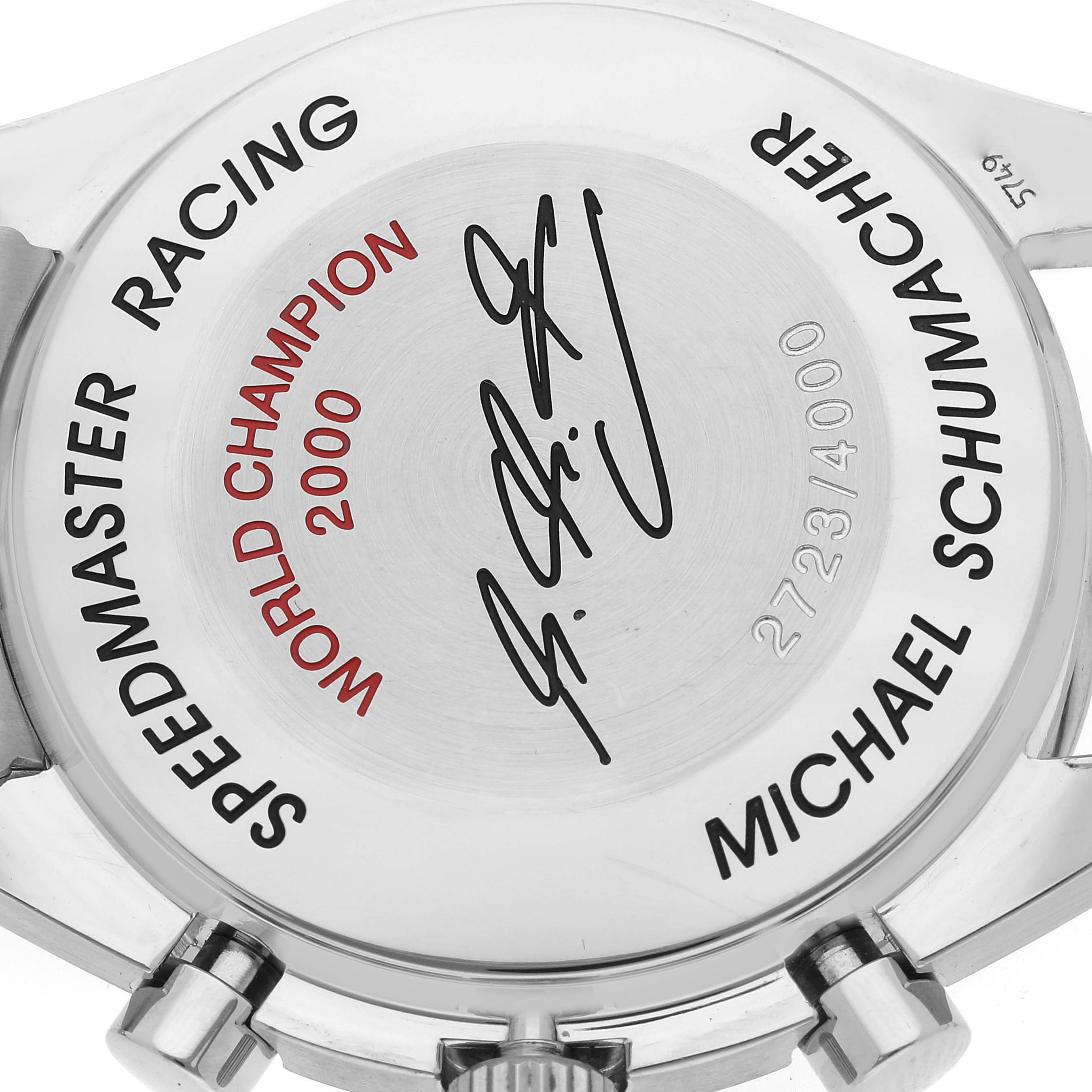 The image shows the engraved case back of an Omega Speedmaster 3517.30.00 Men's Stainless Steel Silver Dial 3517.30.00 Men's Stainless Steel Silver Dial Racing model, featuring a signature and inscriptions.