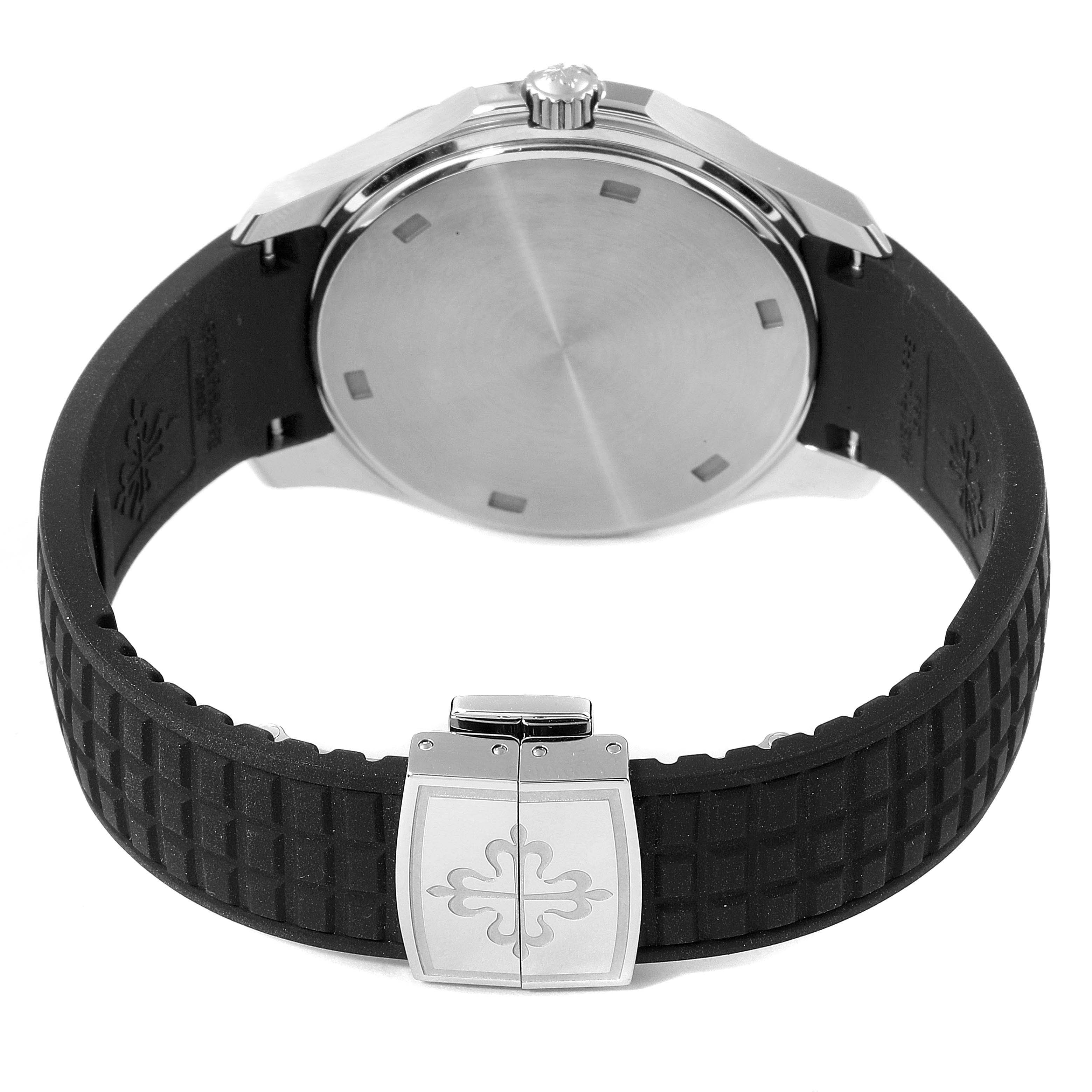 The image shows the back case and strap of a Patek Philippe Aquanaut 5267/200A - 01 Men's Stainless Steel Black Dial 5267/200A - 01 Men's Stainless Steel Black Dial watch, with a clasp featuring the brand's logo.