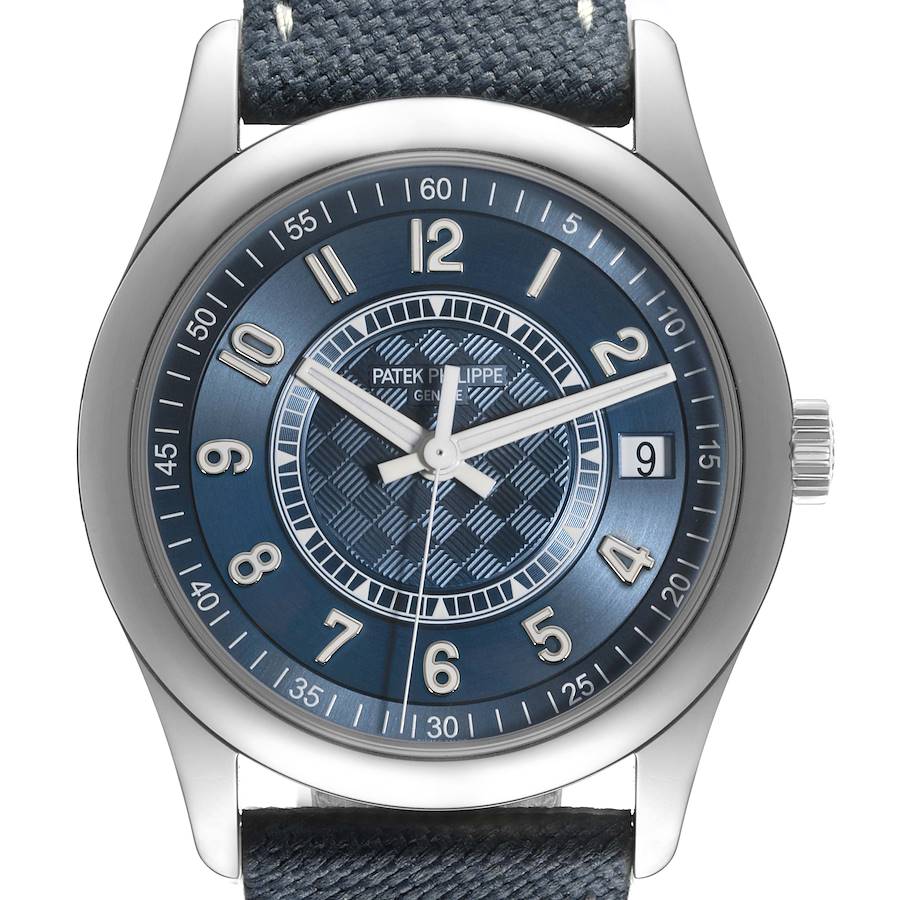 The Patek Philippe Calatrava watch is shown from a front angle, highlighting its blue dial and numeral markings.