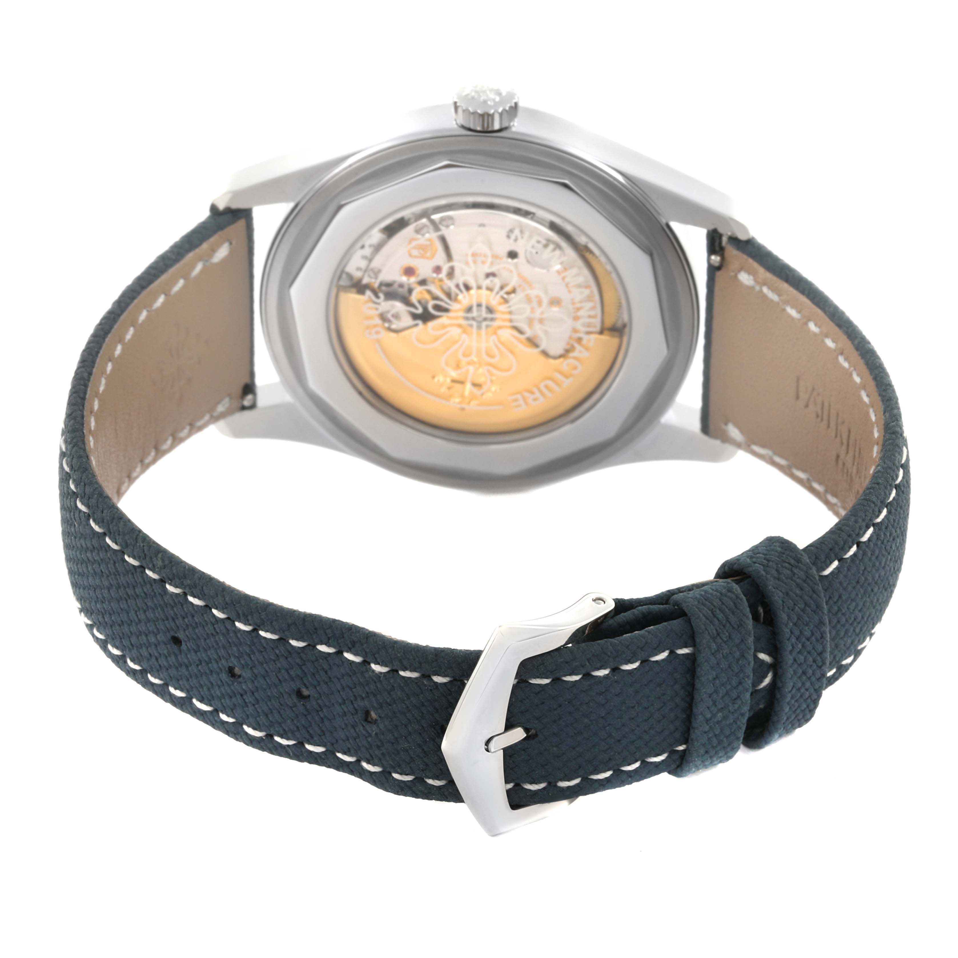 The image shows a Patek Philippe Calatrava 6007A-001 Men's Stainless Steel Blue Dial 6007A-001 Men's Stainless Steel Blue Dial watch from the back, highlighting the movement and strap.