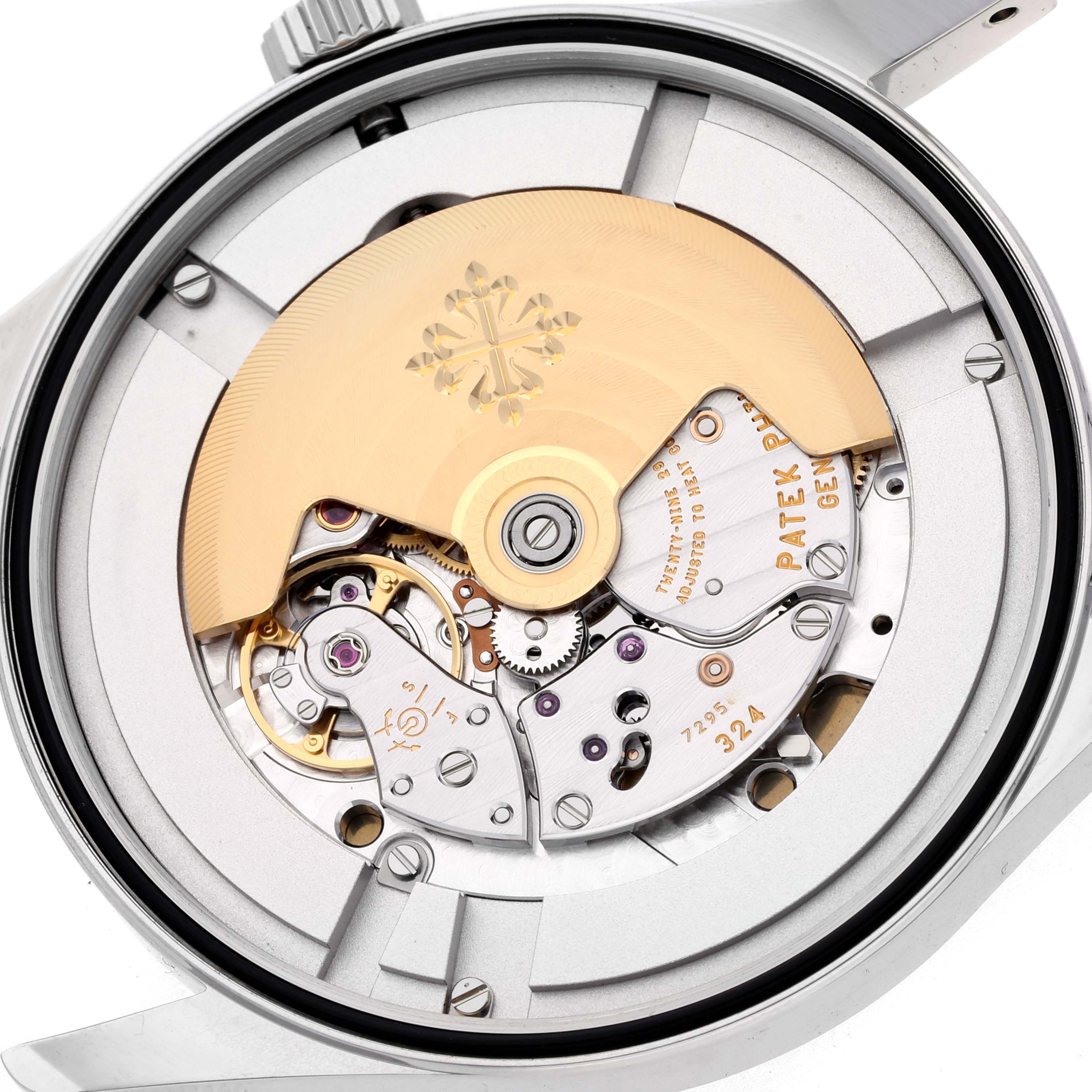 This image shows the movement of the Patek Philippe Calatrava 6007A-001 Men's Stainless Steel Blue Dial 6007A-001 Men's Stainless Steel Blue Dial watch, viewed from the back, featuring its intricate mechanical parts.